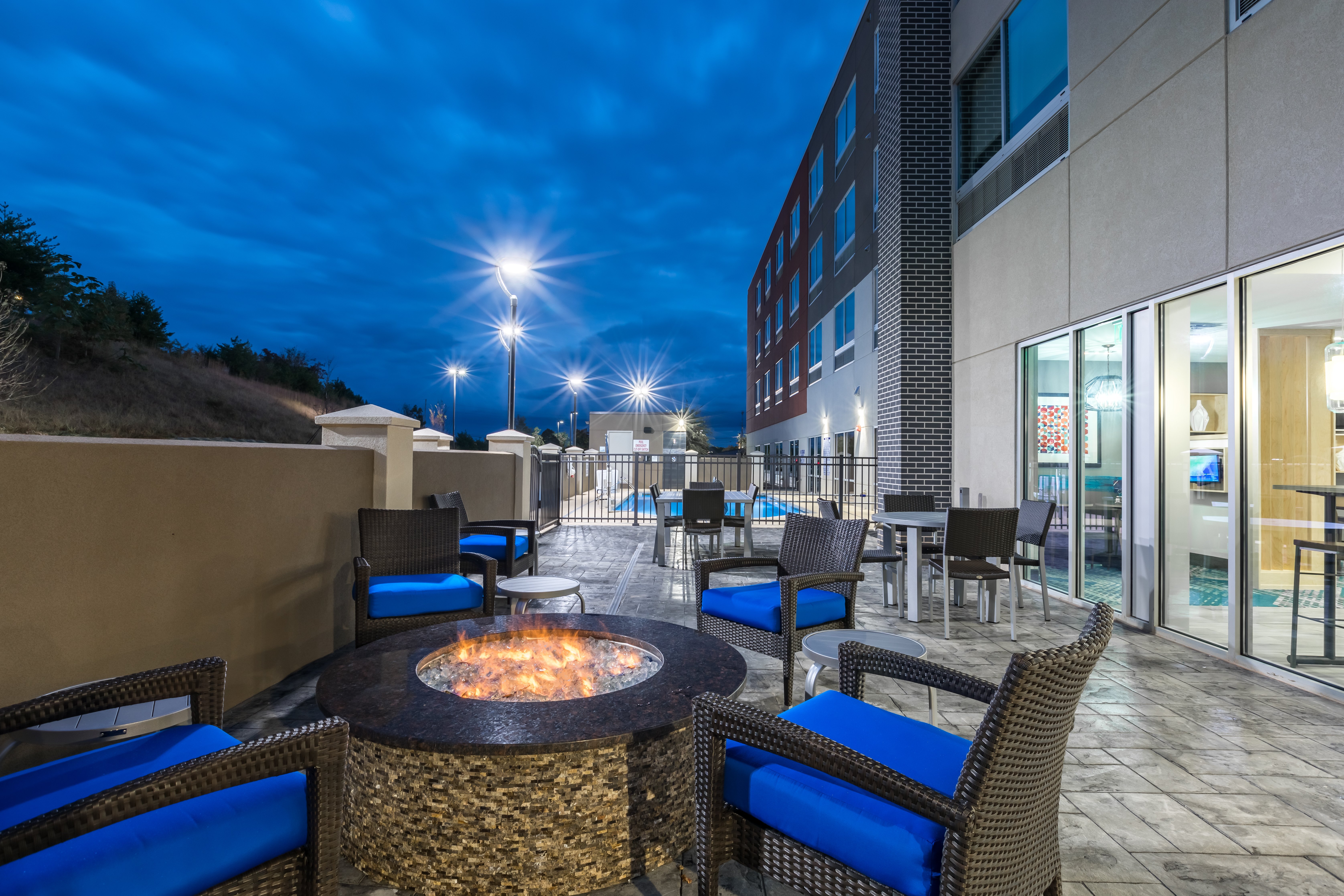 relax after a long day by our firepit and lounging area