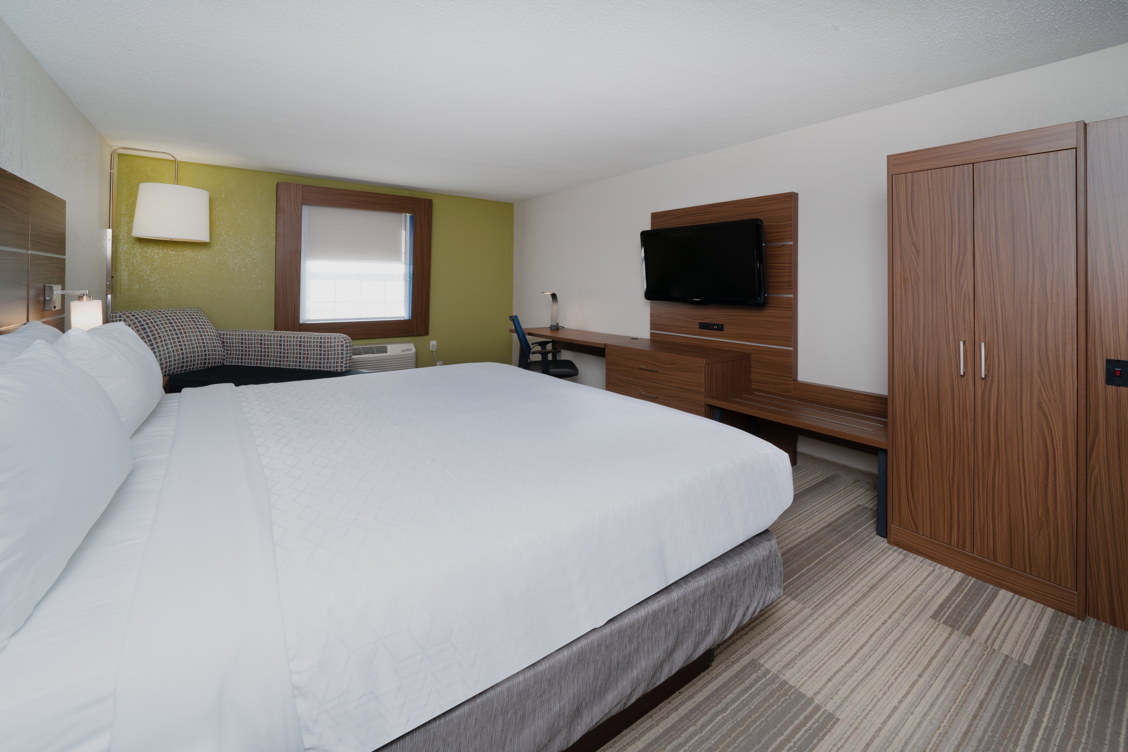 HOLIDAY INN EXP PRINCE FREDRCK BY I-guestroom-Unwind in your room while you watch your favorite TV show..jpg