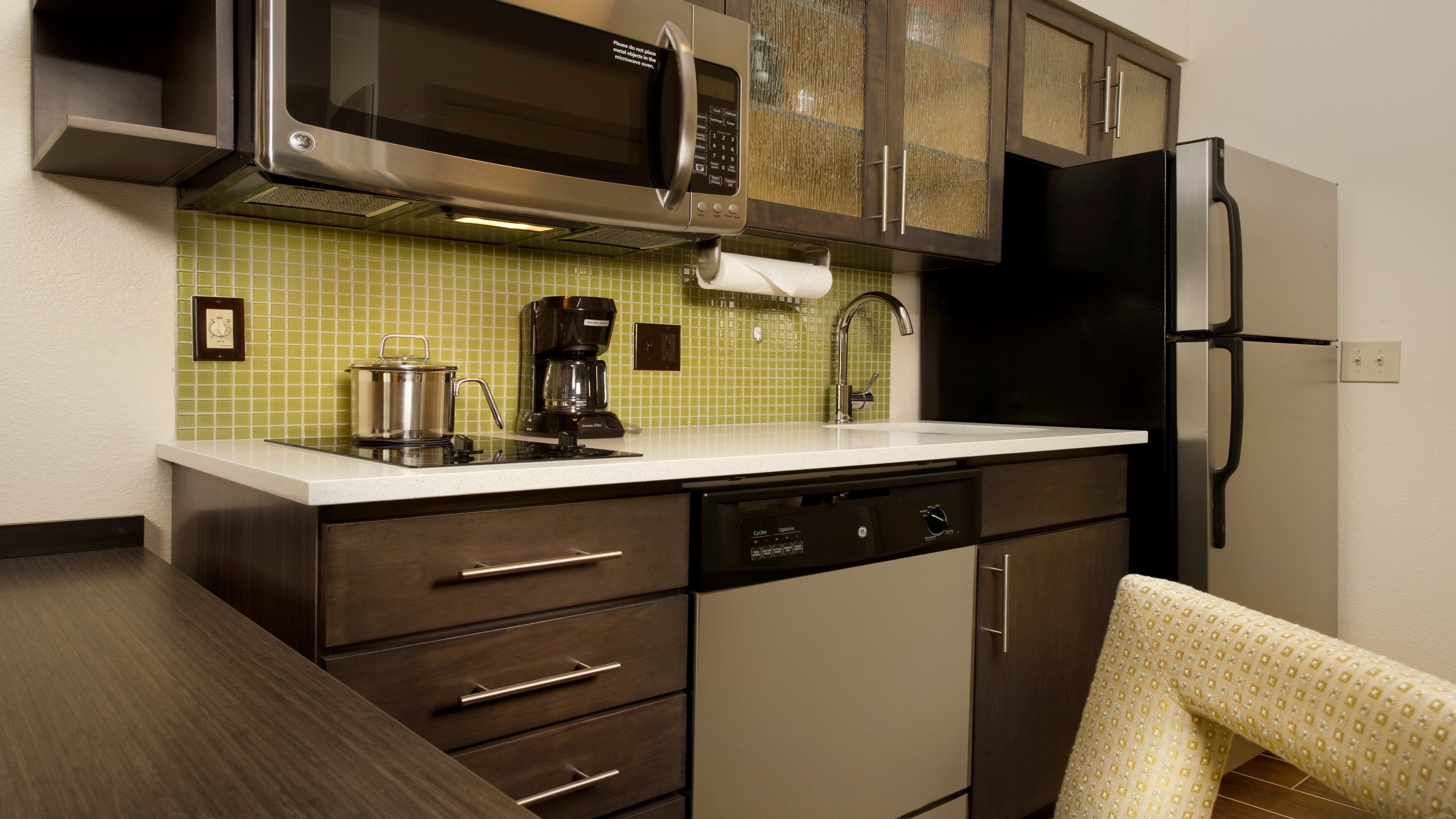 CANDLEWOOD STES ALEXANDRIA -FT BY I-guestroom-Full kitchen with fridge, stovetop, microwave, cookware & utensils.jpg