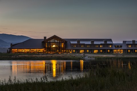 Exterior Overlooking Pond At Dusk