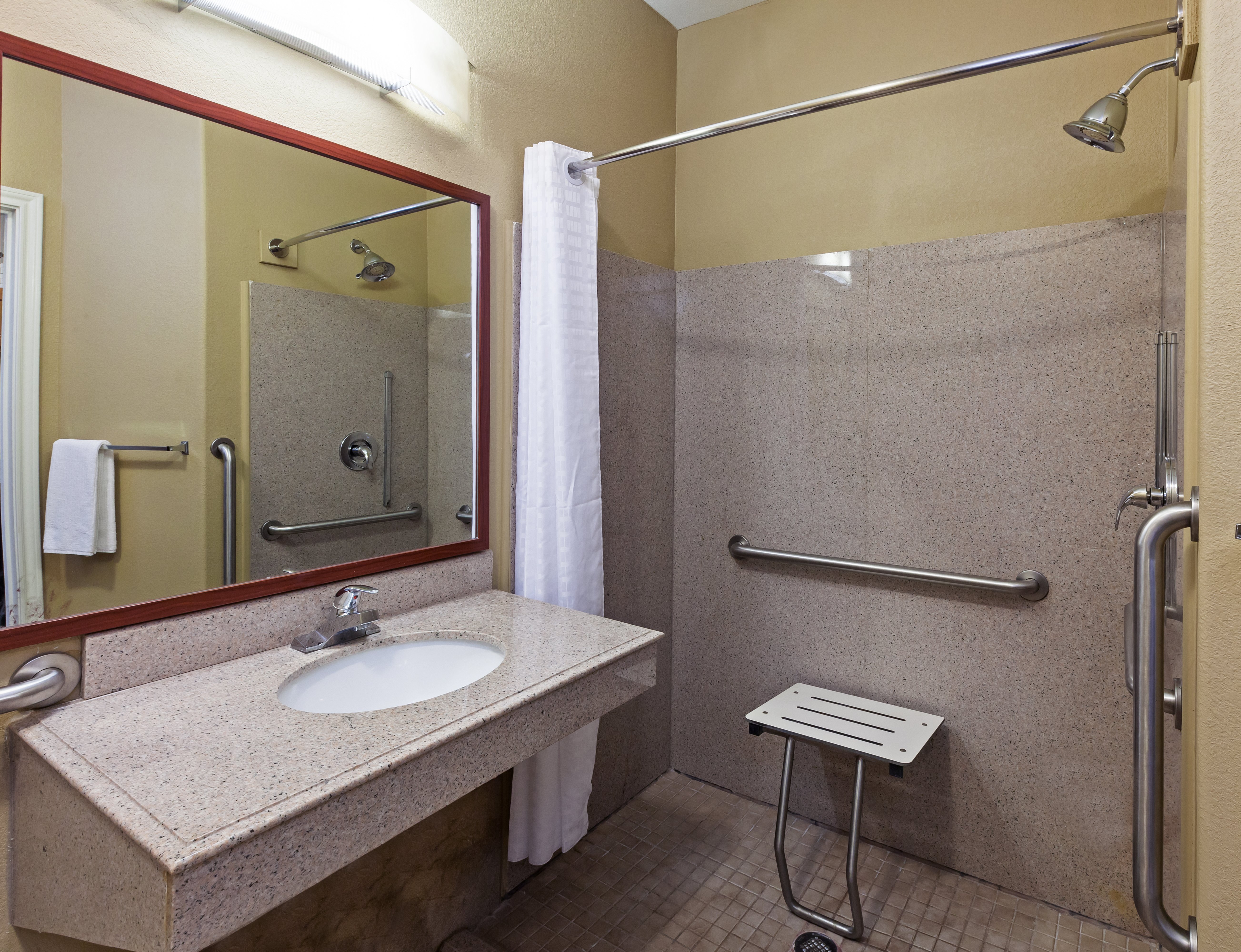 CANDLEWOOD STES TEXAS CITY W BY IHG-guestroom-ADA/Handicapped accessible Guest Bathroom with roll-in shower.jpg
