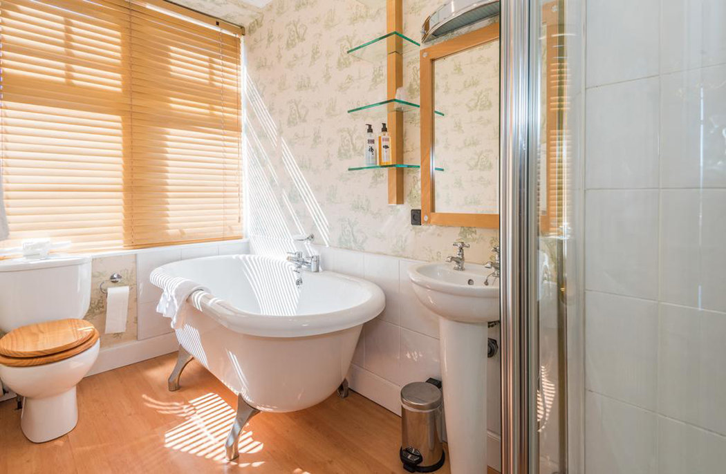 The Boat Hotel-guestroom-Suite Bathroom.jpg