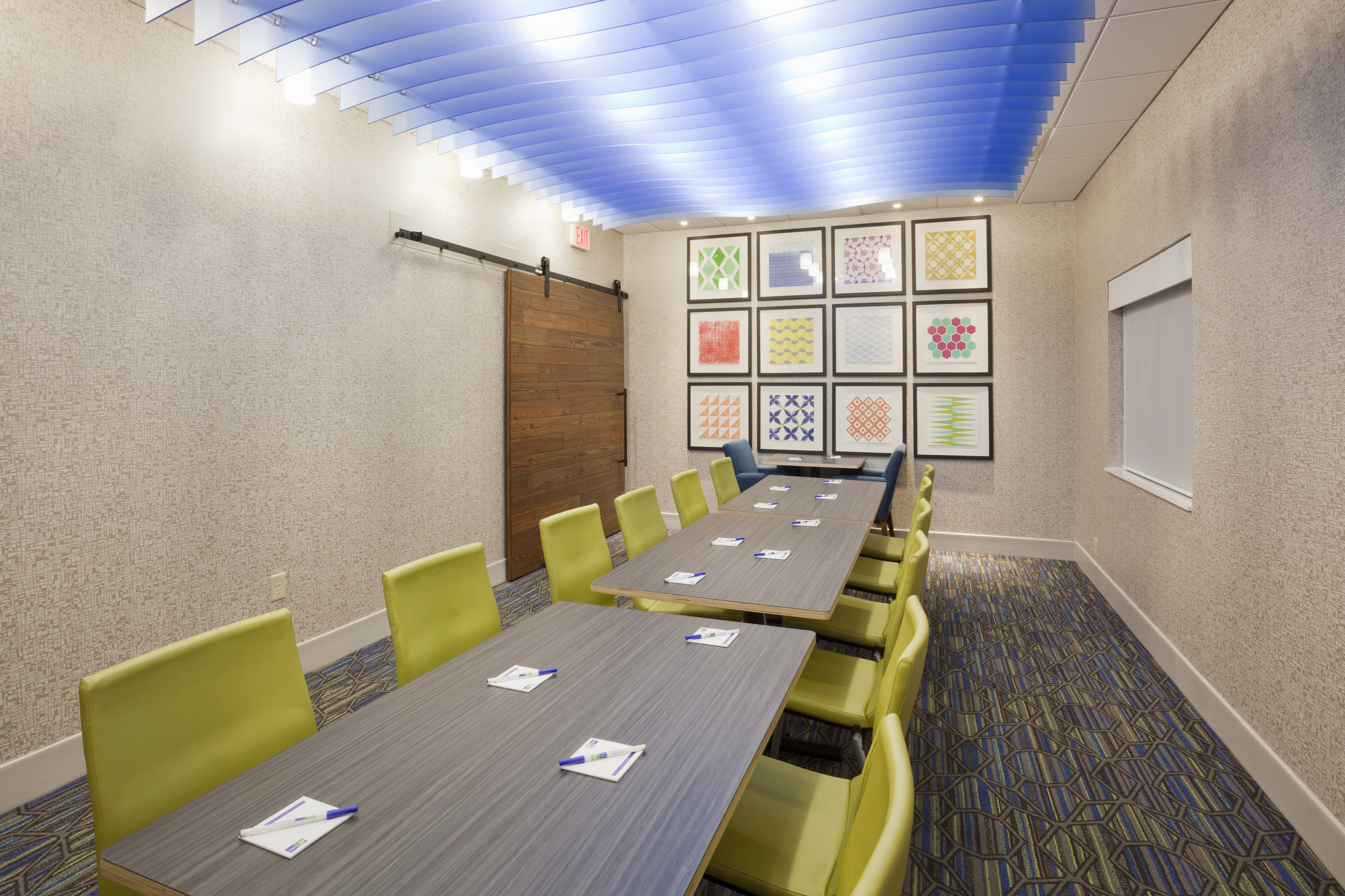 Our board room has a bright design and windows for productive days