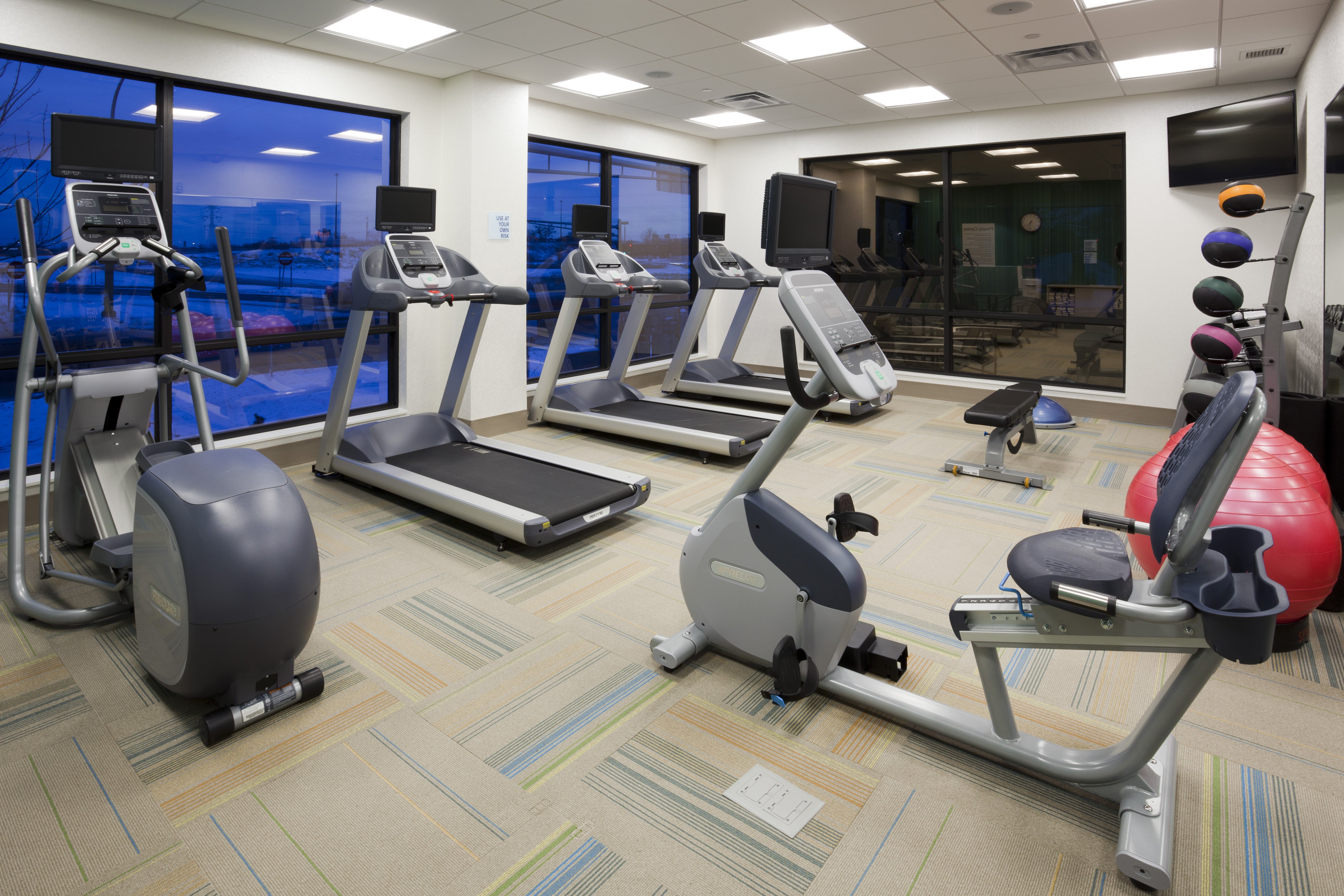 Our onsite fitness center has fitness equipment and free weights!