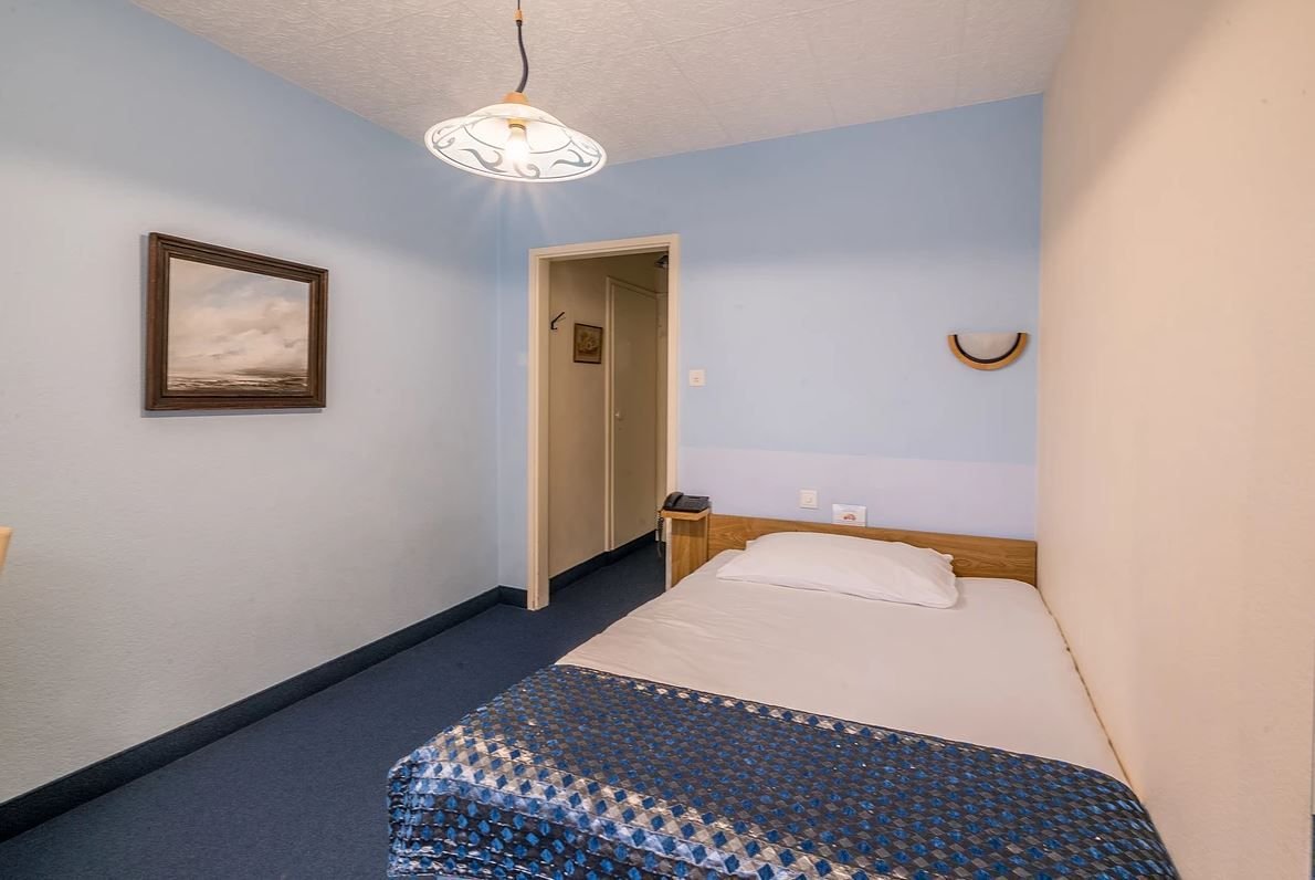 HOTEL TOURING AU LAC-guestroom-Single City Side.jpg