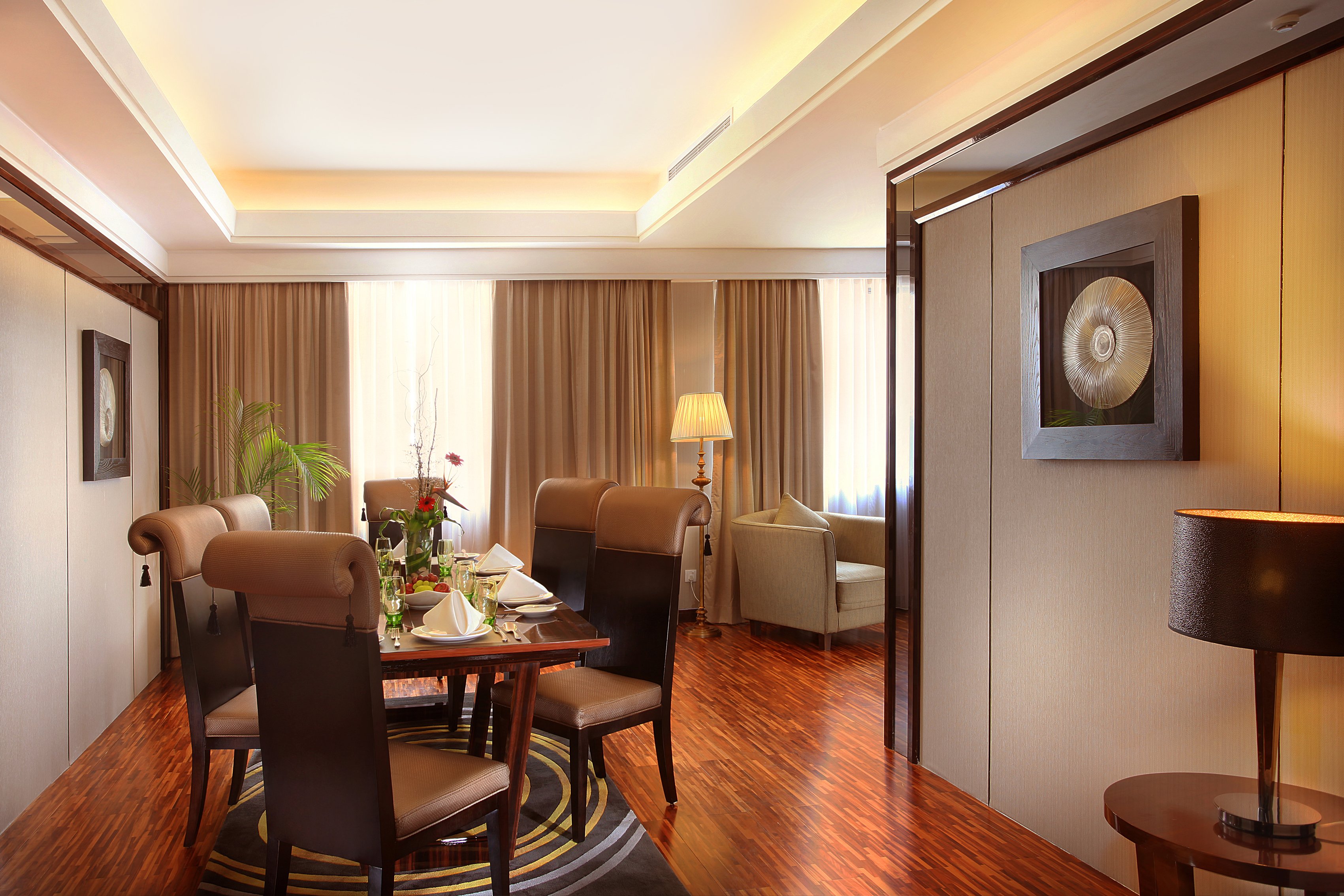Swiss-Belhotel Harbour Bay-guestroom-SBHBPresident Suite Living Room.jpg