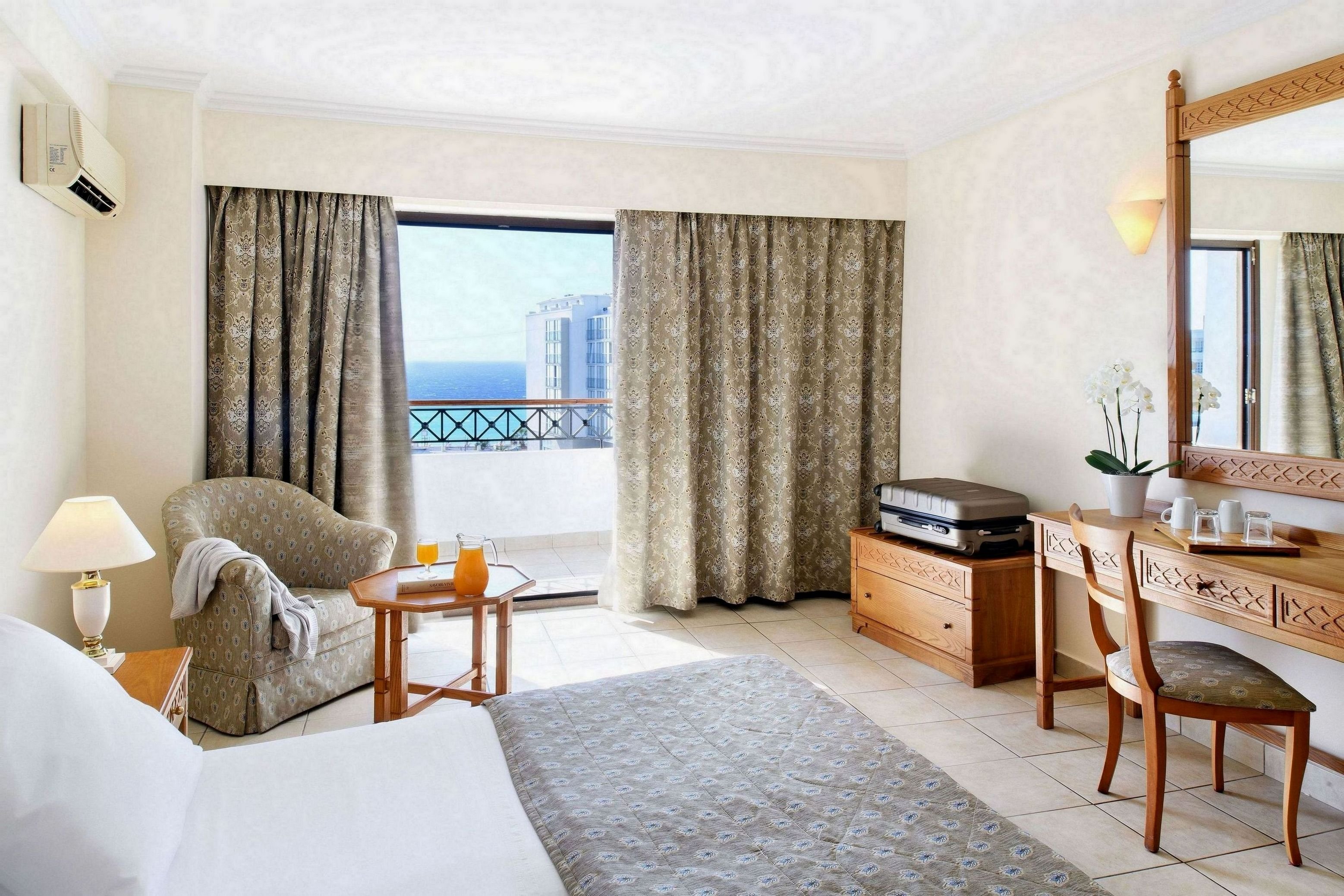 MITSIS PETIT PALAIS-guestroom-Suite.jpg