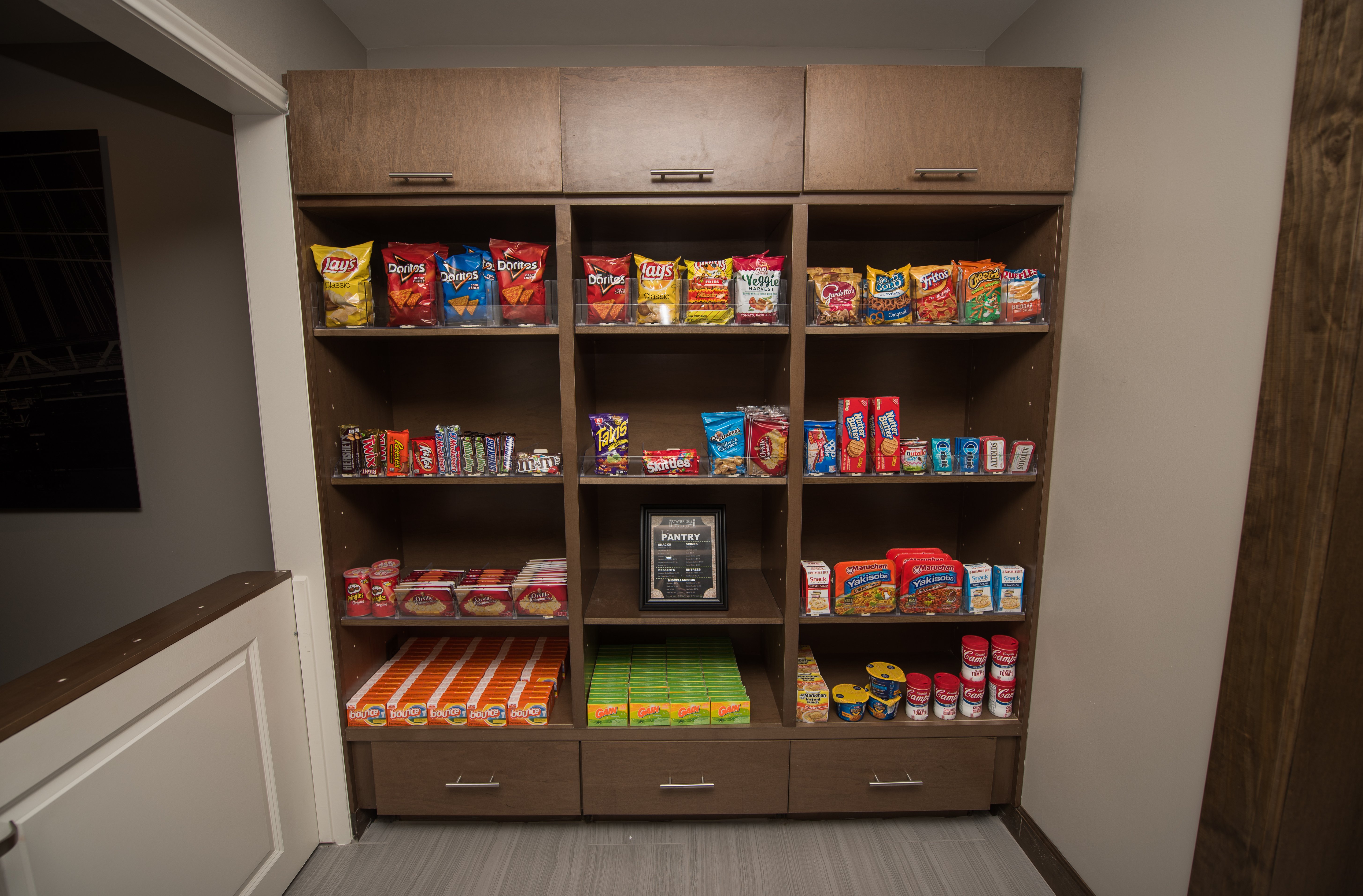 STAYBRIDGE STES HUMBLE BY IHG-guestroom-Snacks & drinks for purchase 24/7 at the Staybridge Suites Pantry.jpg