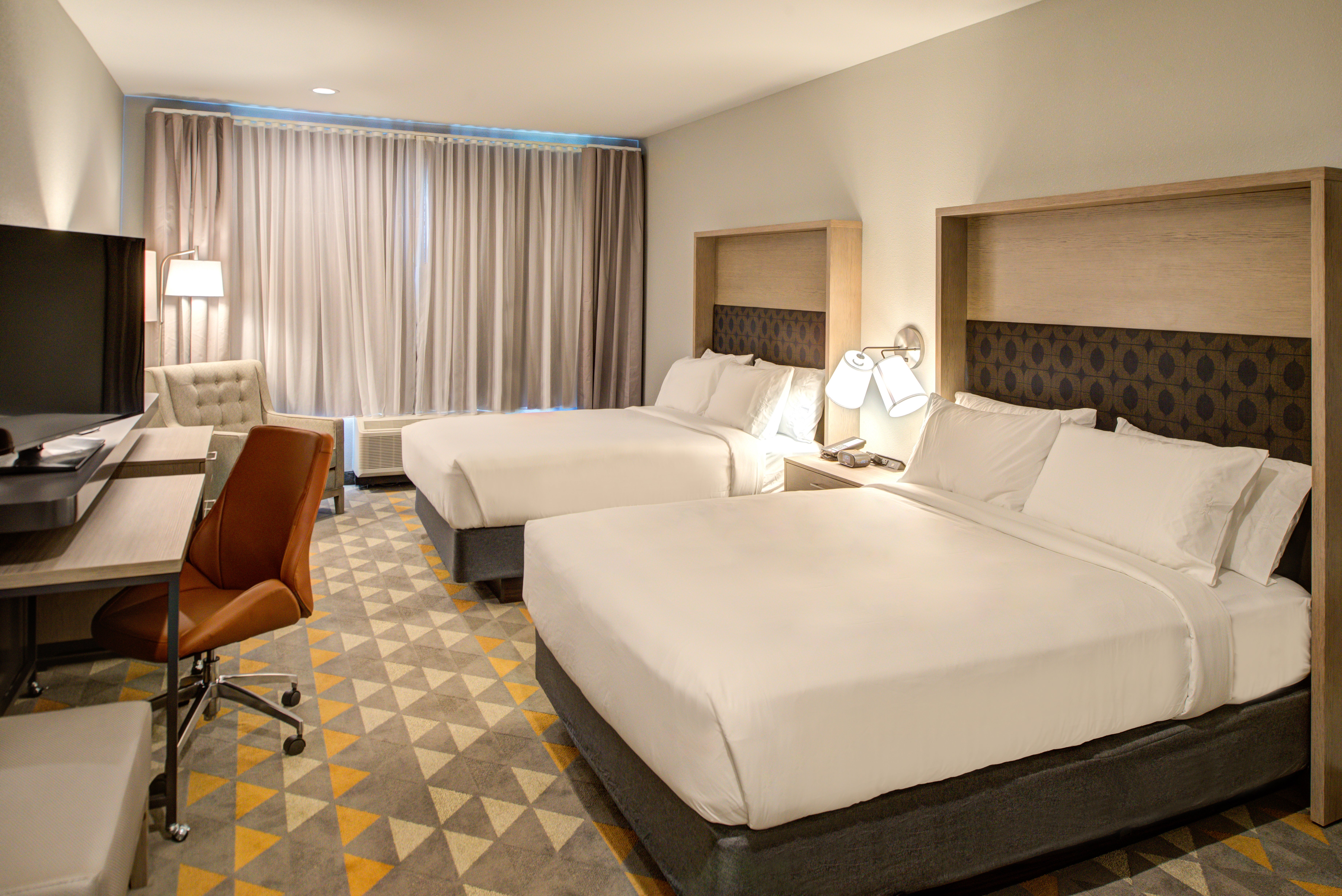 Stretch out and enjoy extra space in our Double Queen Room