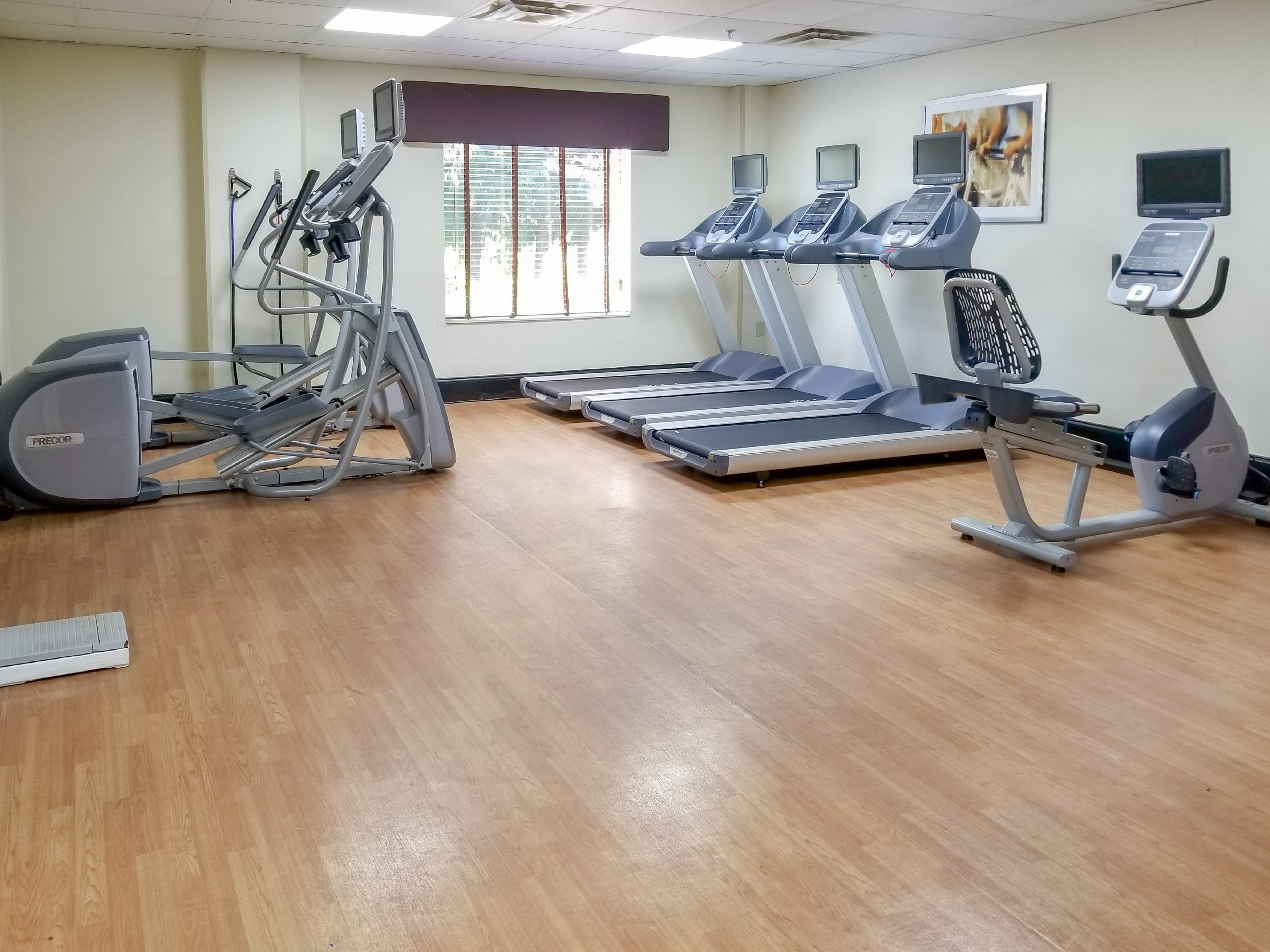 24 hr fitness center with six PreCor machines + free weights