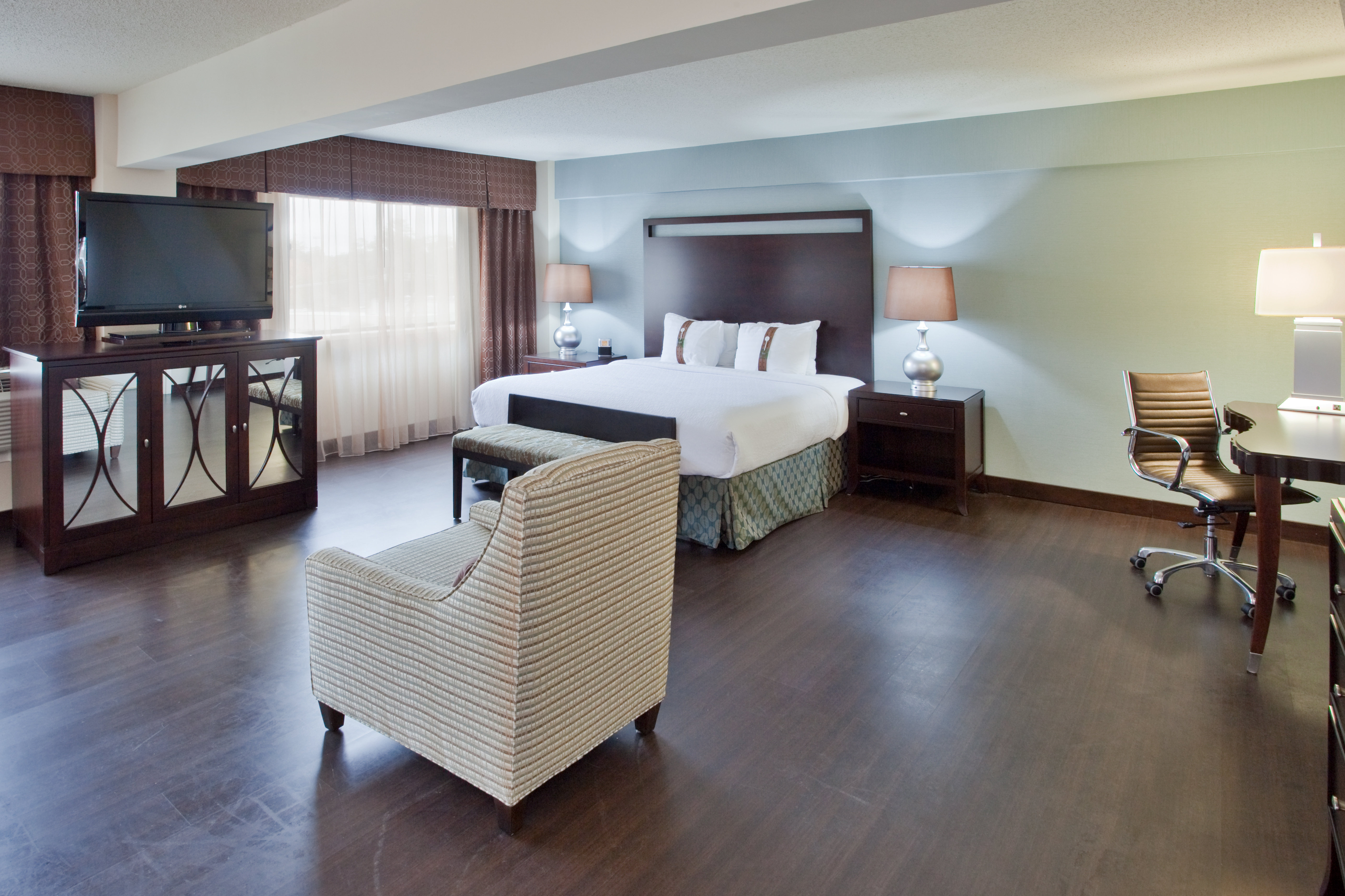 HOLIDAY INN VA BEACH NORFOLK BY IHG-guestroom-Our King Executive Suites are perfect for couples or executives!.jpg
