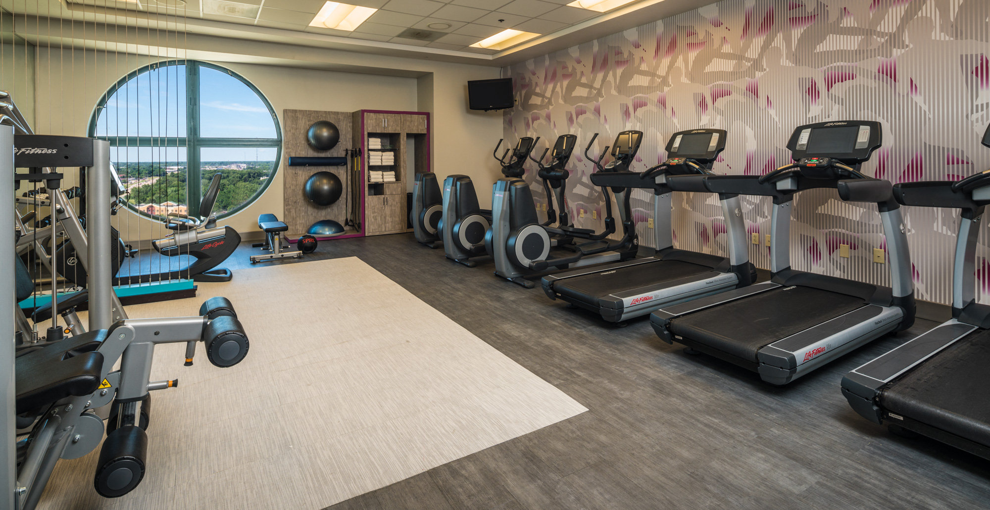 Enjoy our 24/7 full-service Fitness Center.