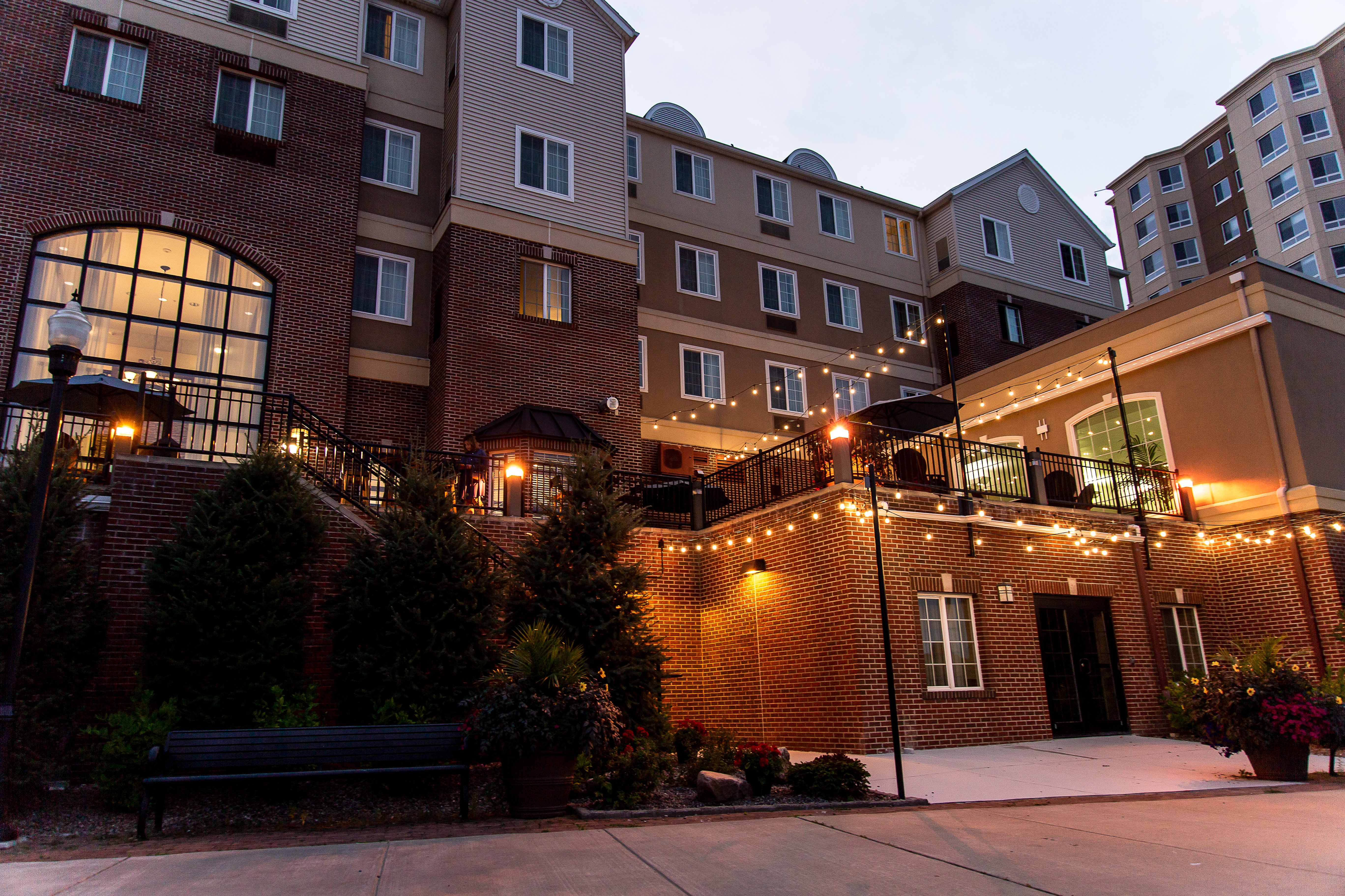 STAYBRIDGE STES ROCHESTER EAST BY I-guestroom-view of Staybridge Suites Rochester from Genesee River.jpg