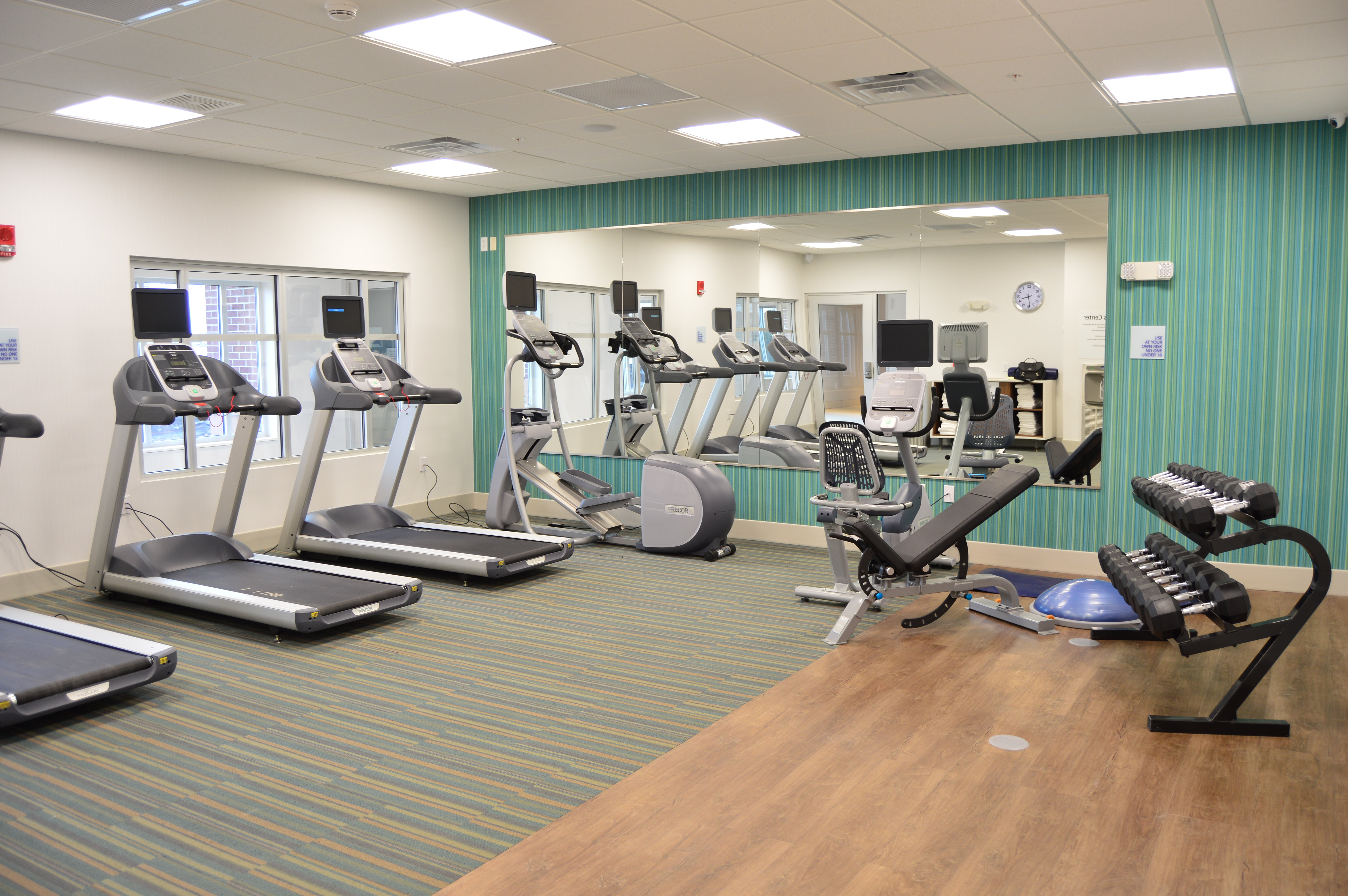 Modern Fitness Room with Extensive Options.