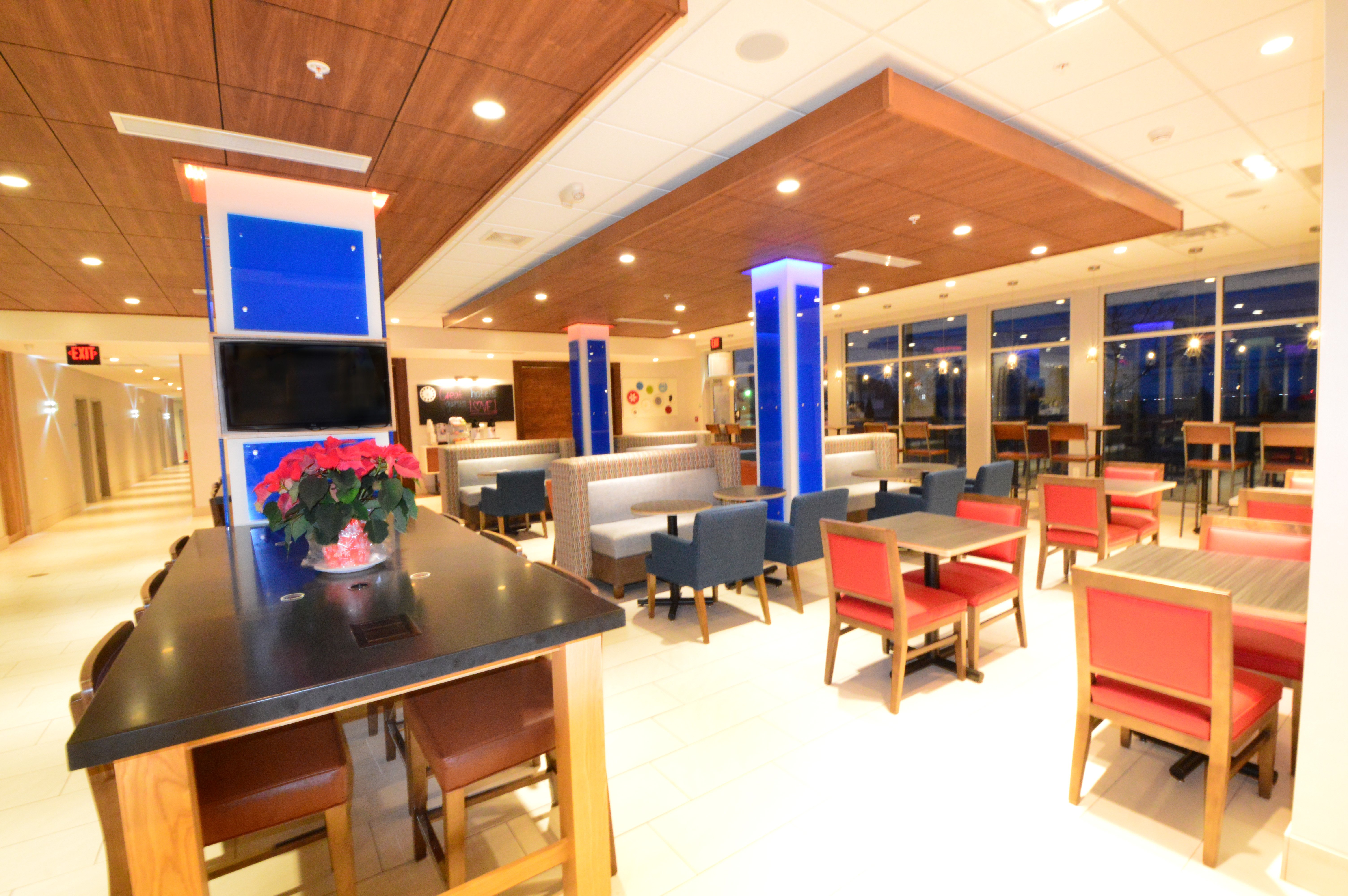 Various seating options during free hot breakfast buffet.