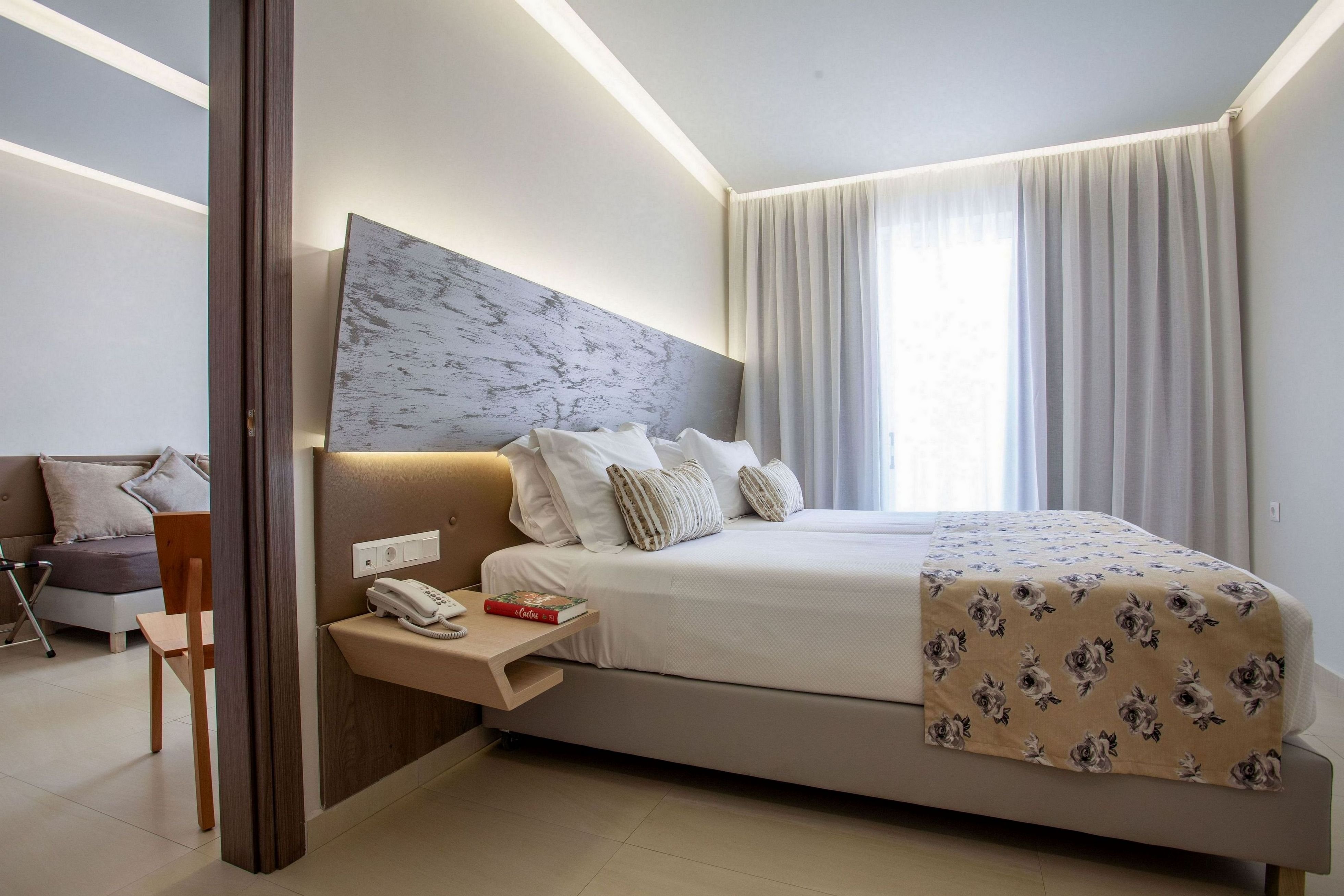 MELROSE RETHYMNO BY MAGE HOTELS-guestroom-Family Suite.jpg