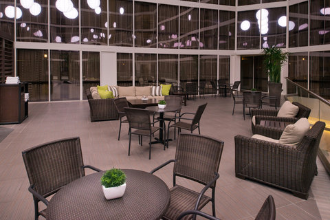Relax in our indoor pool\'s courtyard seating.