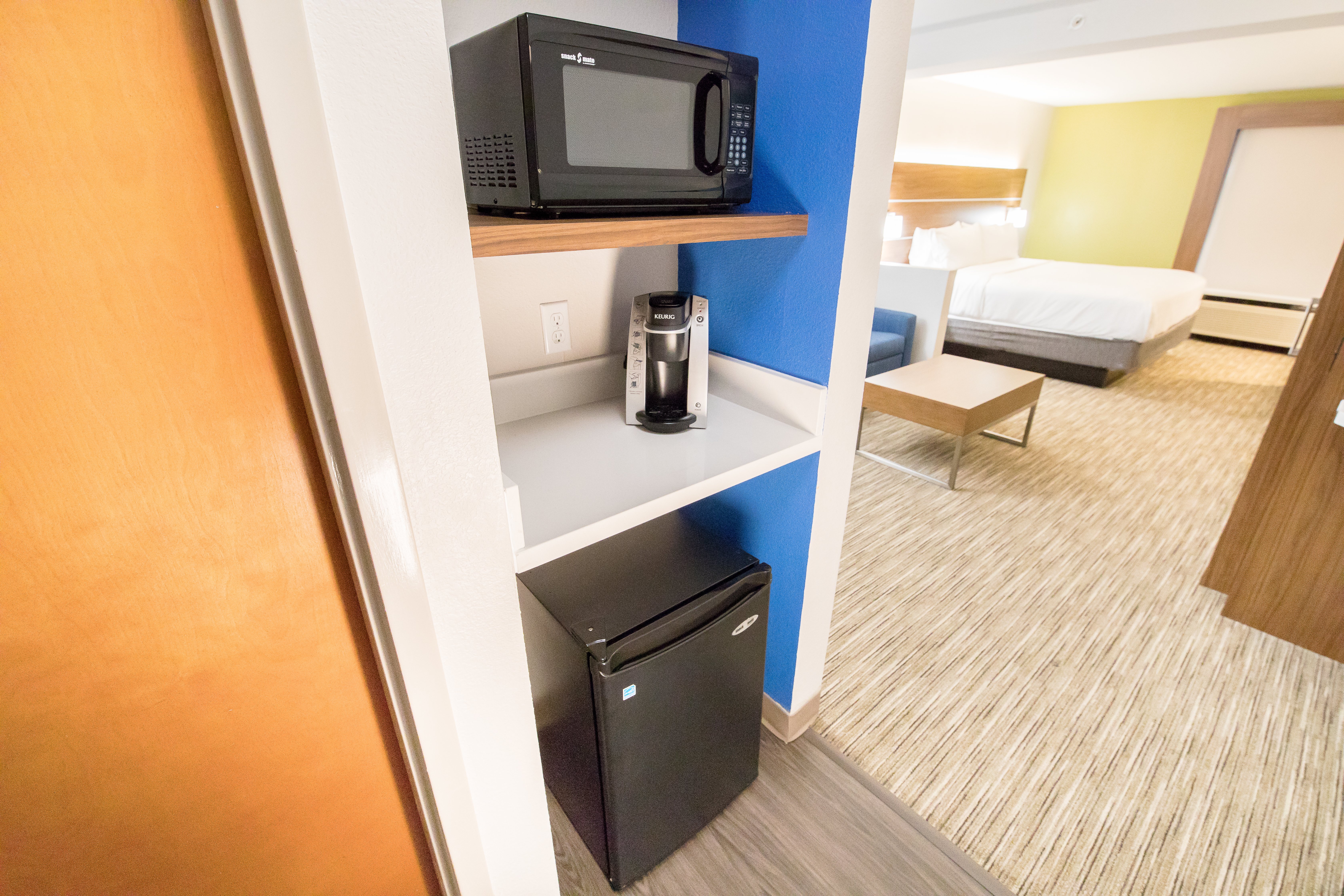 HOLIDAY INN-EXP STONE MOUNTAIN BY I-guestroom-King Suite-Fridge & Microwaves in every room.jpg