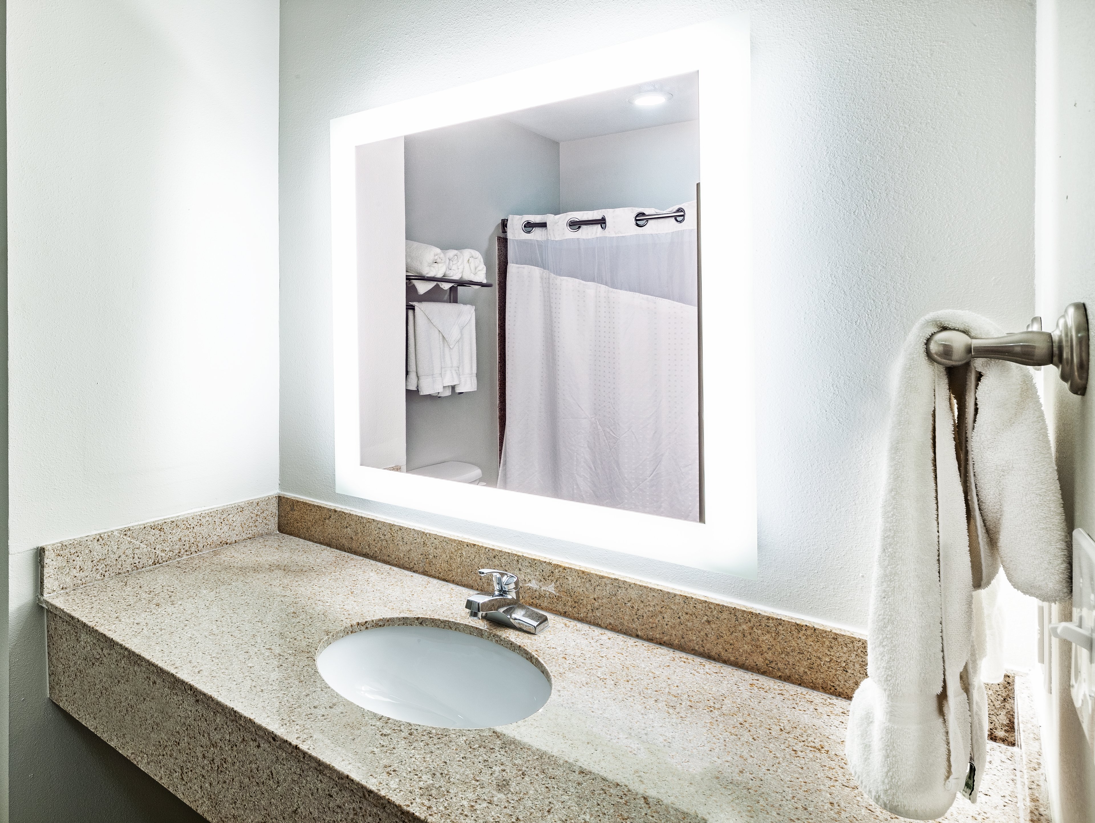 HOLIDAY INN EXP STES S PARK PL BY I-guestroom-Guest Bathroom .jpg