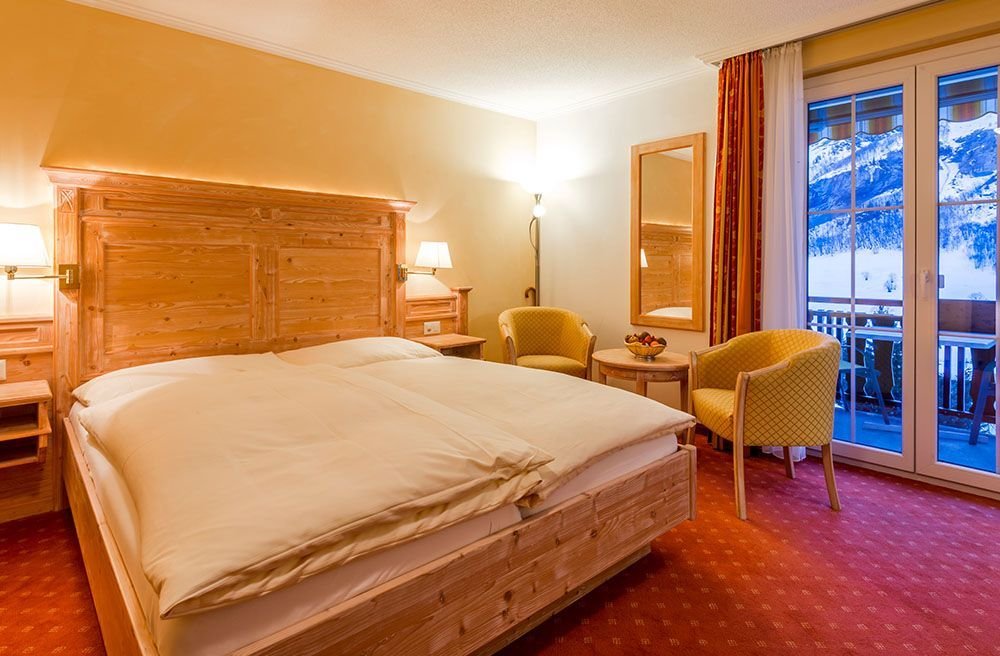 HOTEL RESTAURANT WALDHAUS-guestroom-Double Room South with balcony.jpg