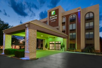 Newly renovated hotel with well lit entrance and porte cochere
