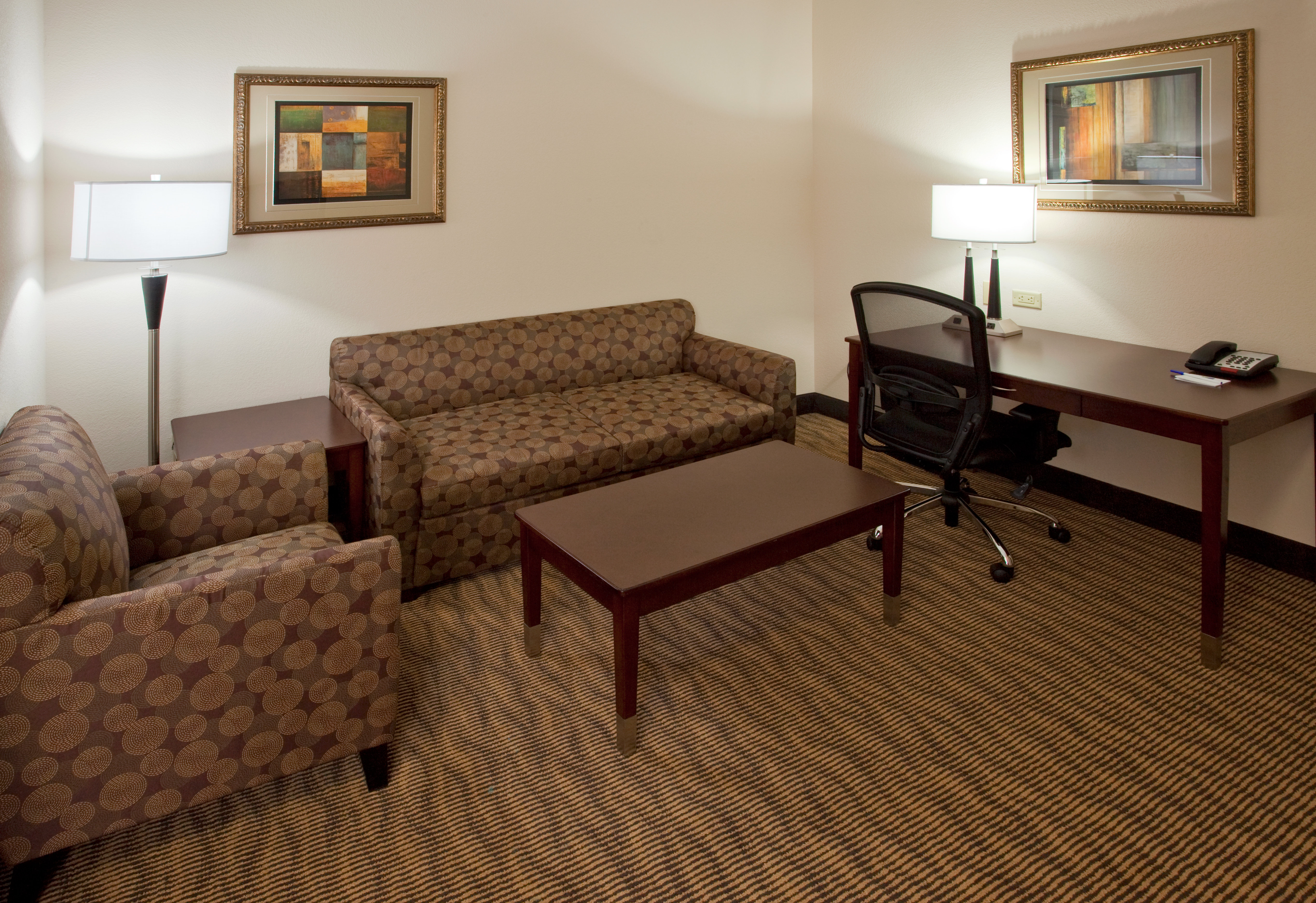 HOLIDAY INN EXP STES BUDA BY IHG-guestroom-Suite.jpg
