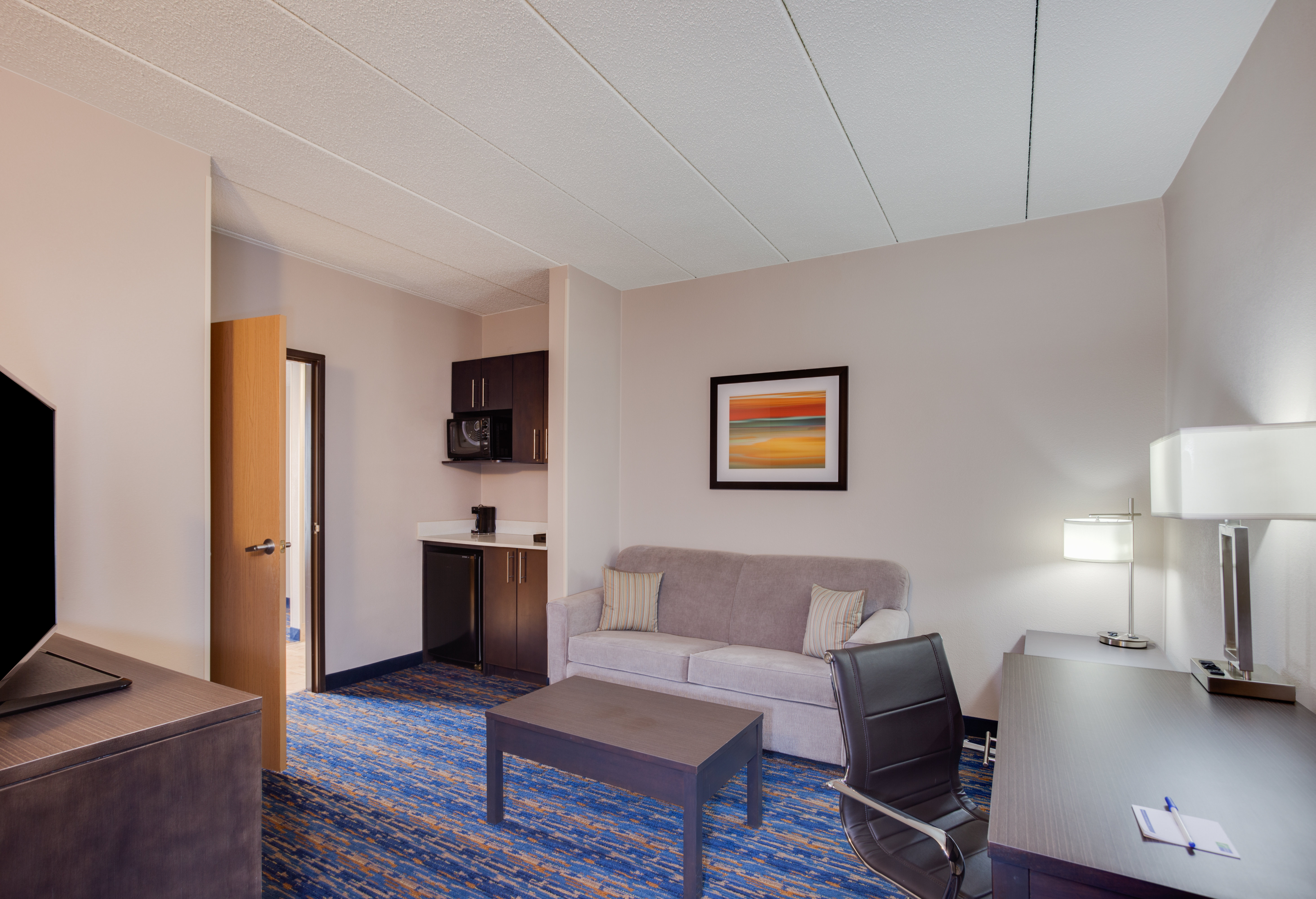 HOLIDAY EXP STES LARGO BY IHG-guestroom-Spacious suites with extended Living Area.jpg