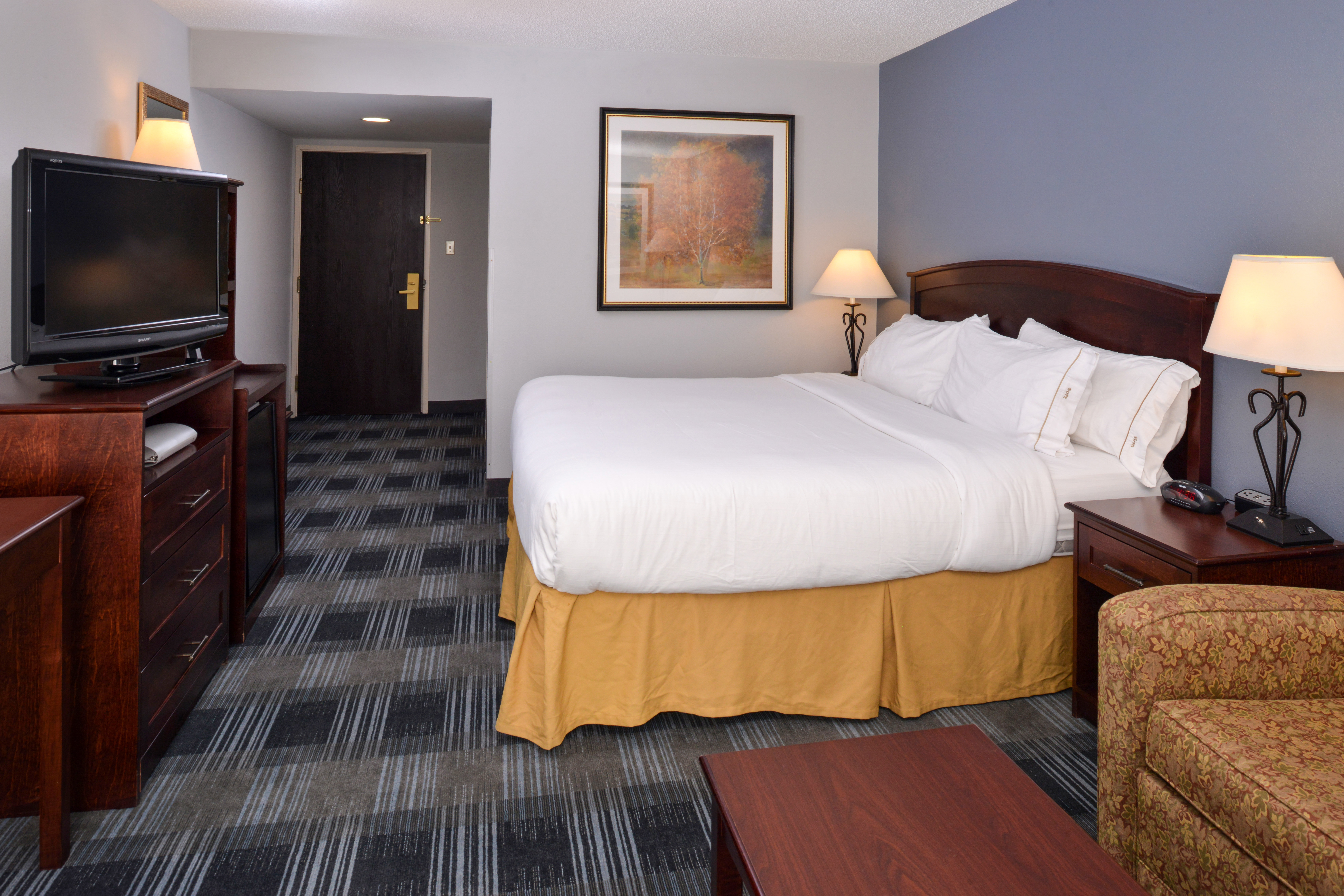 Relax In Our Comfortable Rooms featuring a King Bed