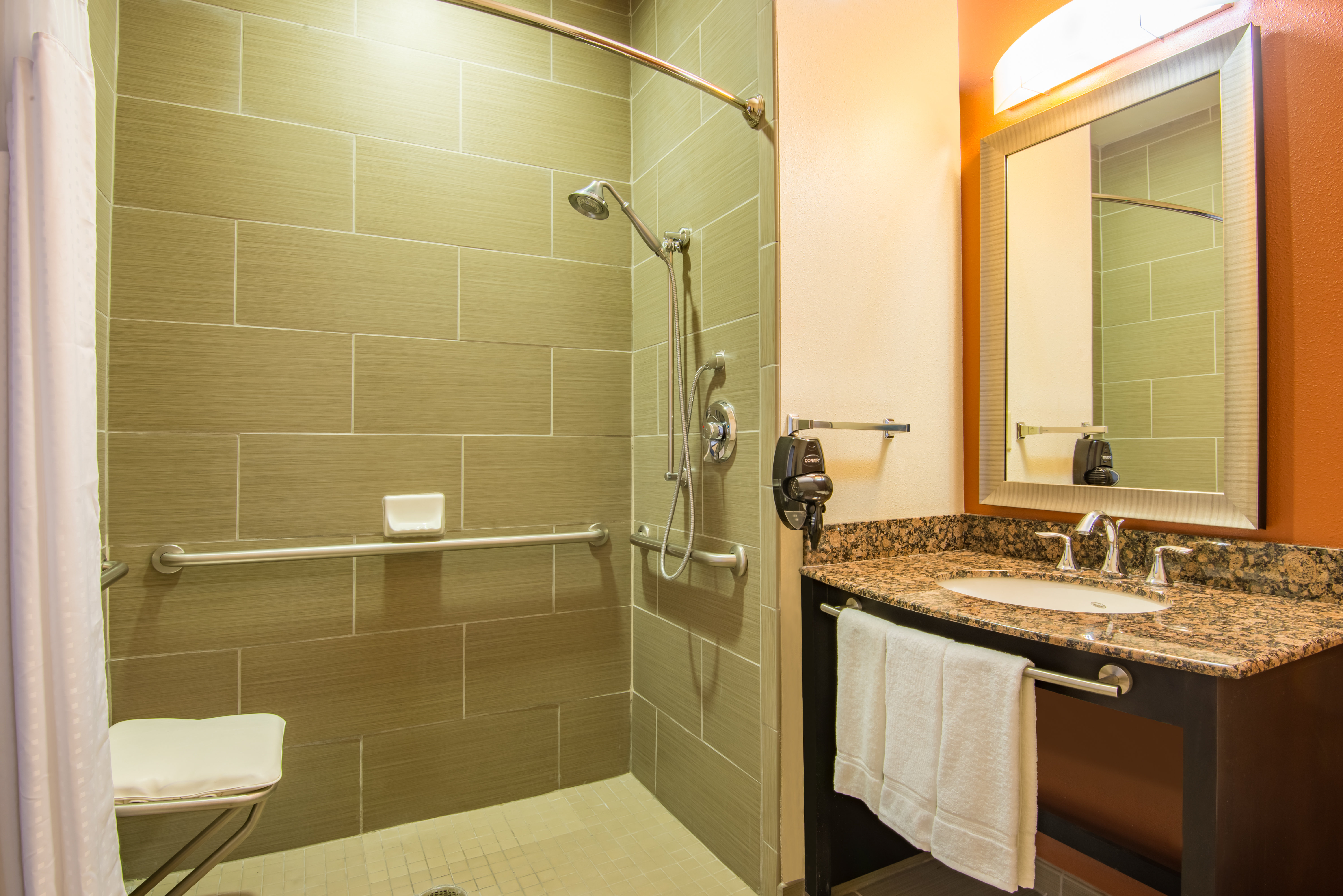 ADA Guest Bathroom with roll-in shower Hobbs NM Hotel