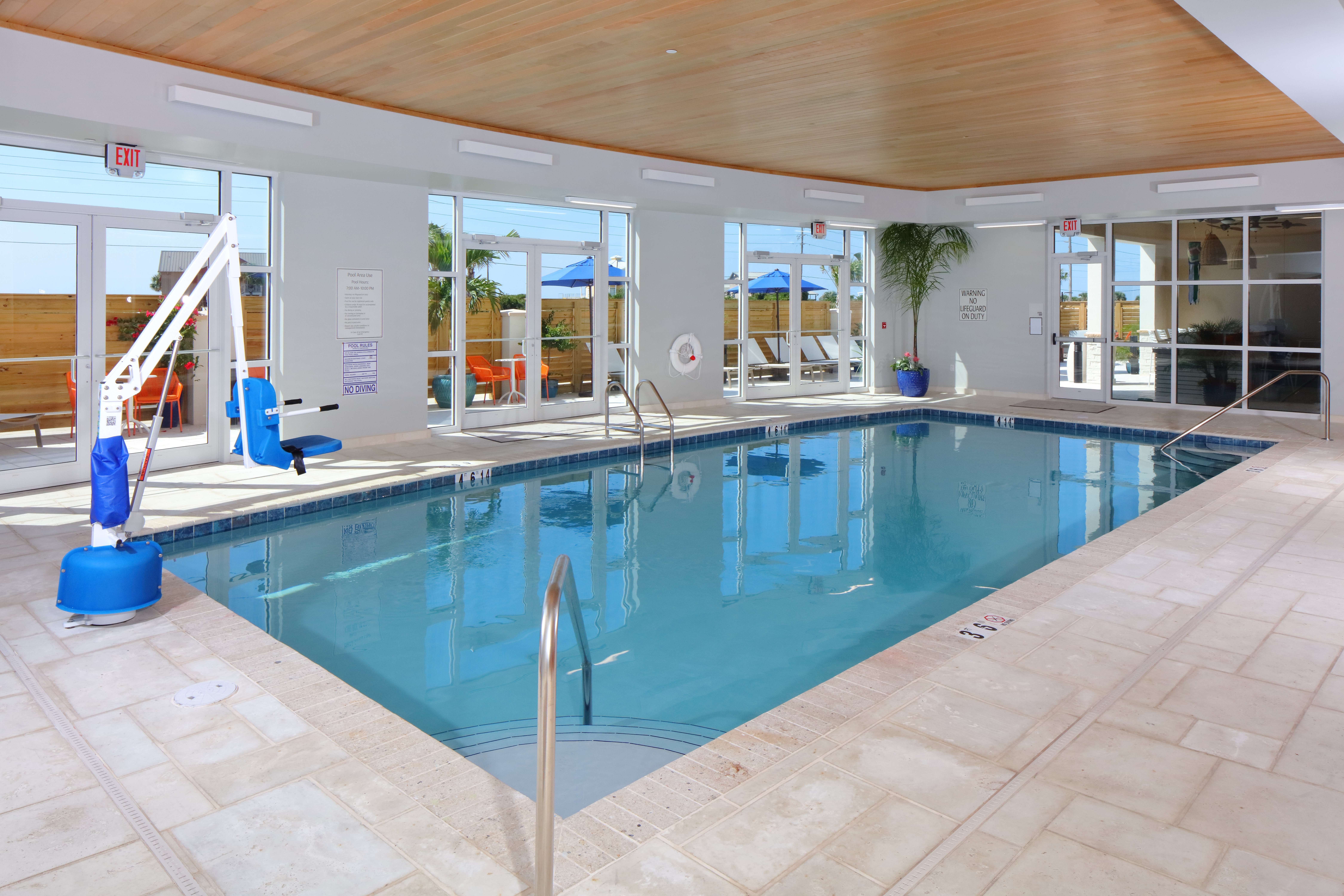 Enjoy our indoor heated pool with views of the Courtyard area