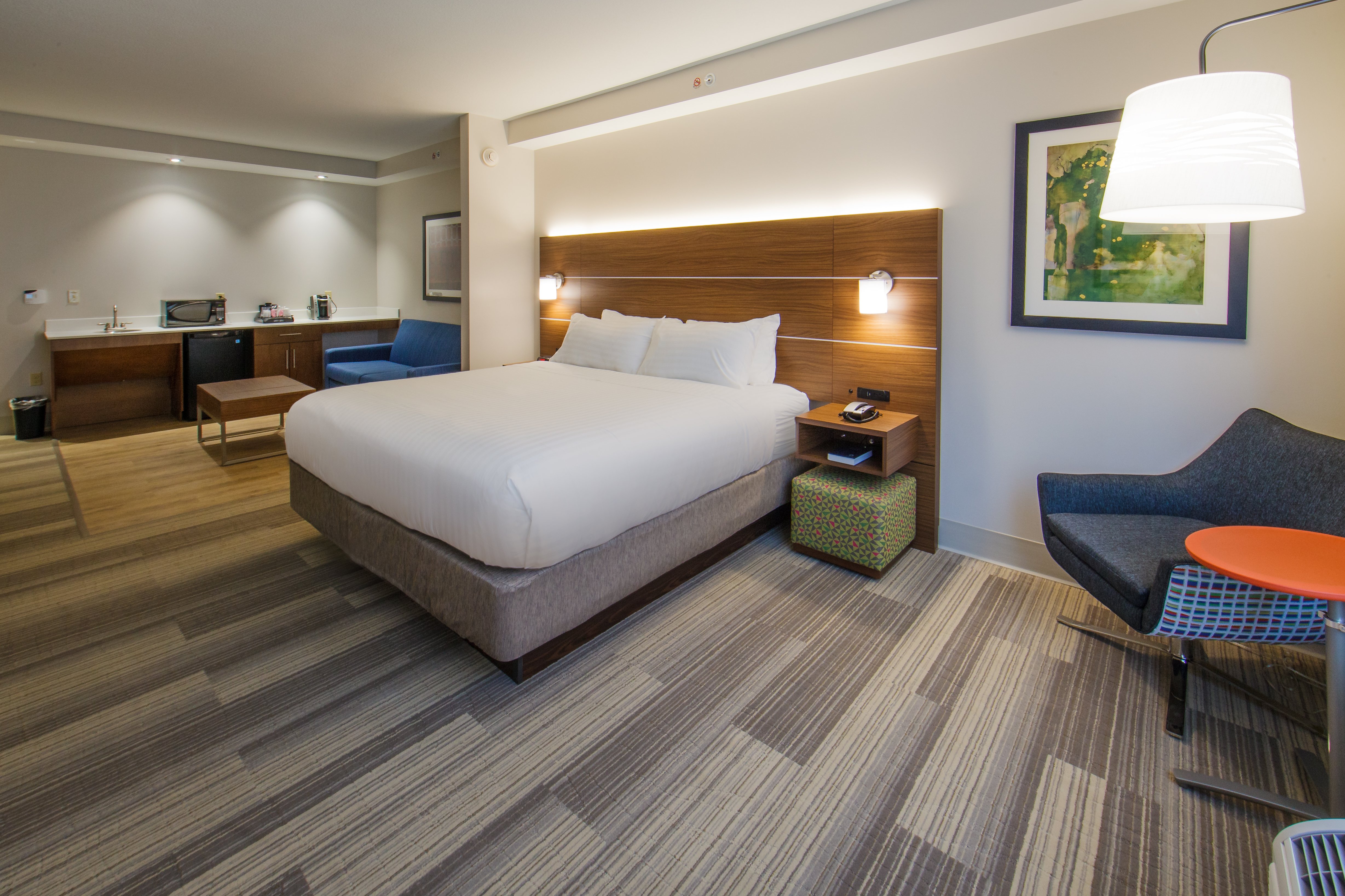 HOLIDAY INN EXP GATLINBURG DWTN BY-guestroom-King triple sheeted bed for your comfort.jpg