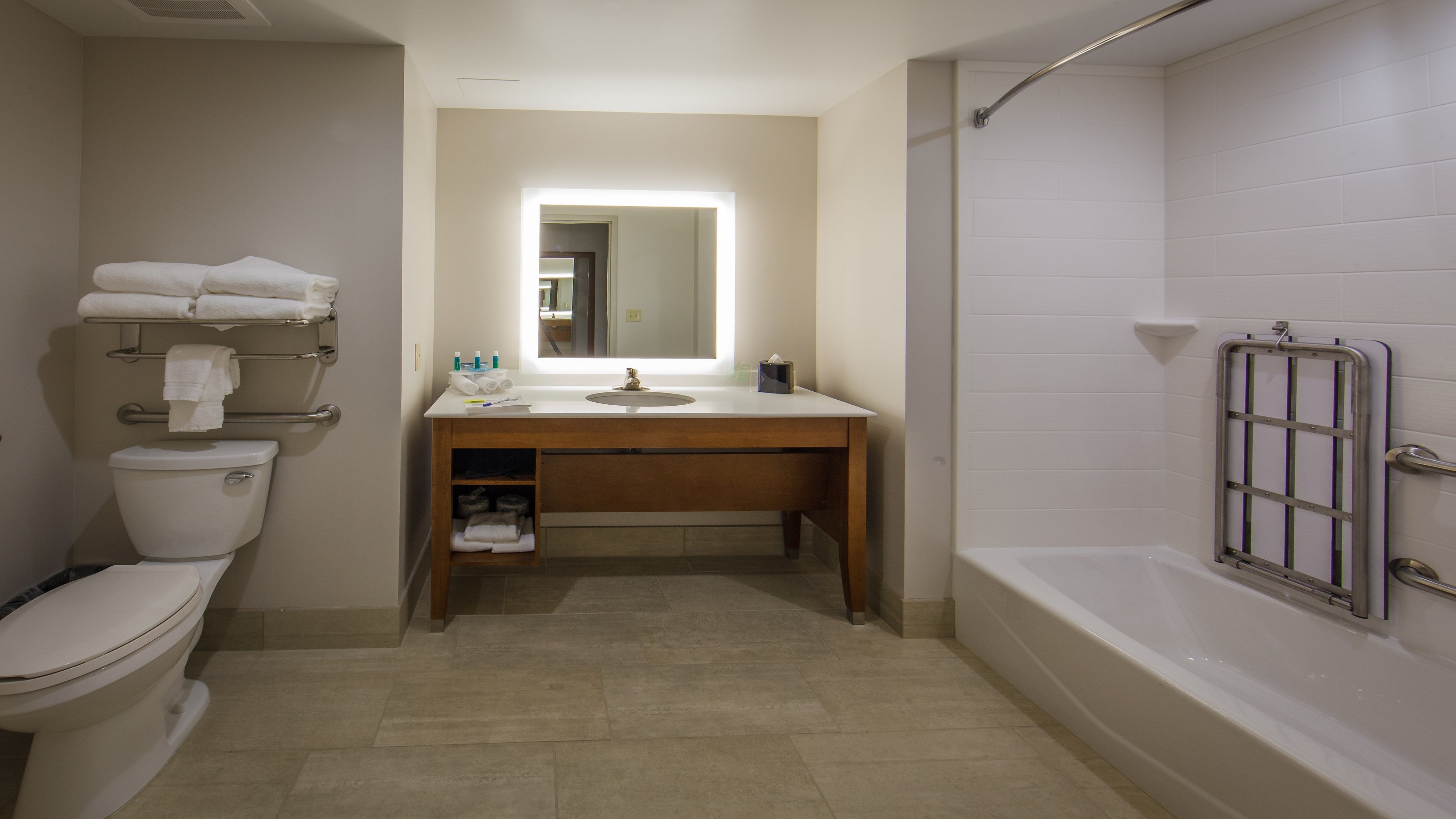 HOLIDAY INN EXP GATLINBURG DWTN BY-guestroom-Standard or Suite ADA Bathroom with bath tub.jpg