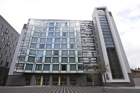 The hotel is located next to the Crowne Plaza Manchester City