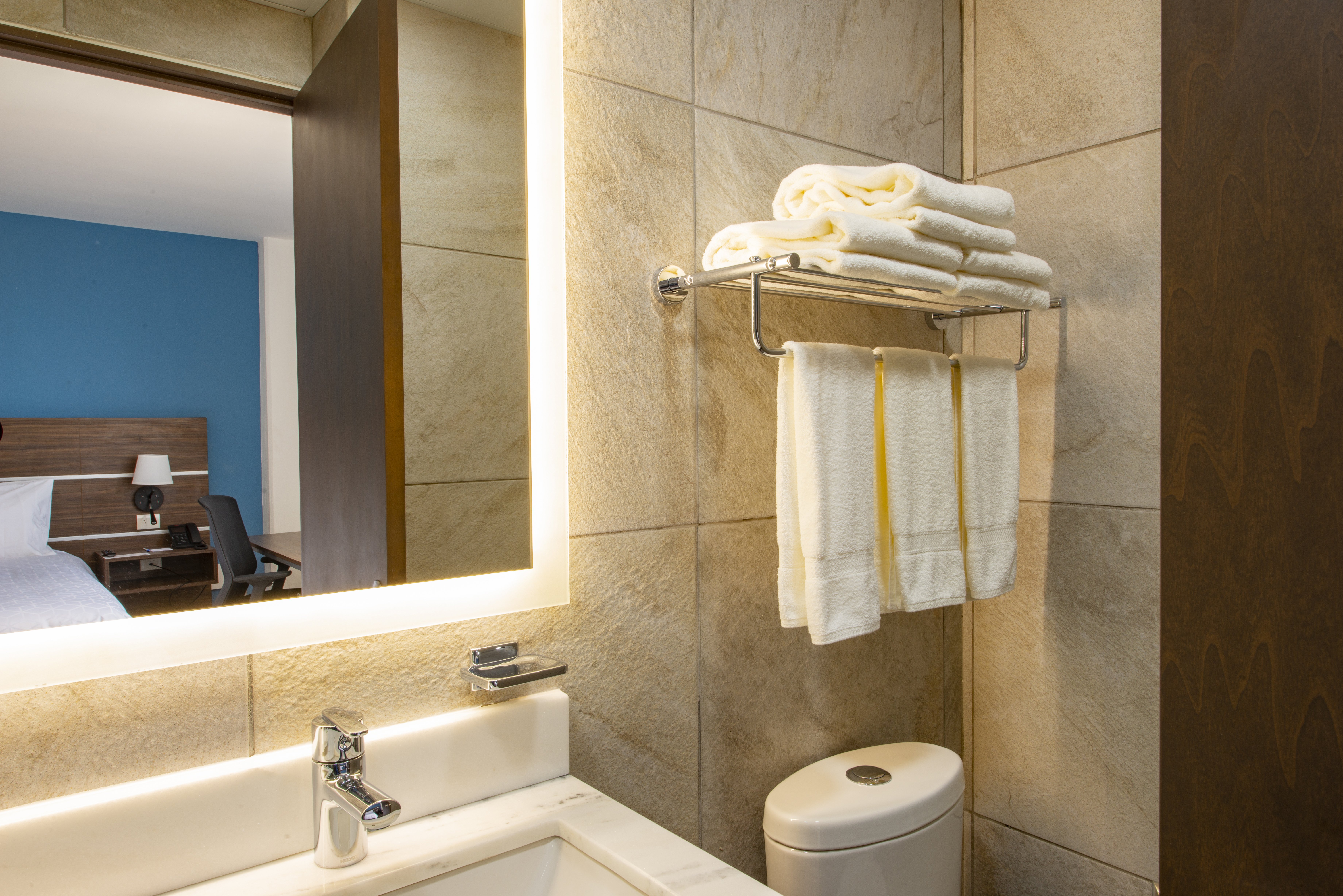 HOLIDAY INN EXP MERIDA CENTRO BY IH-guestroom-Refresh in our spacious bathrooms with thoughtful amenities..jpg