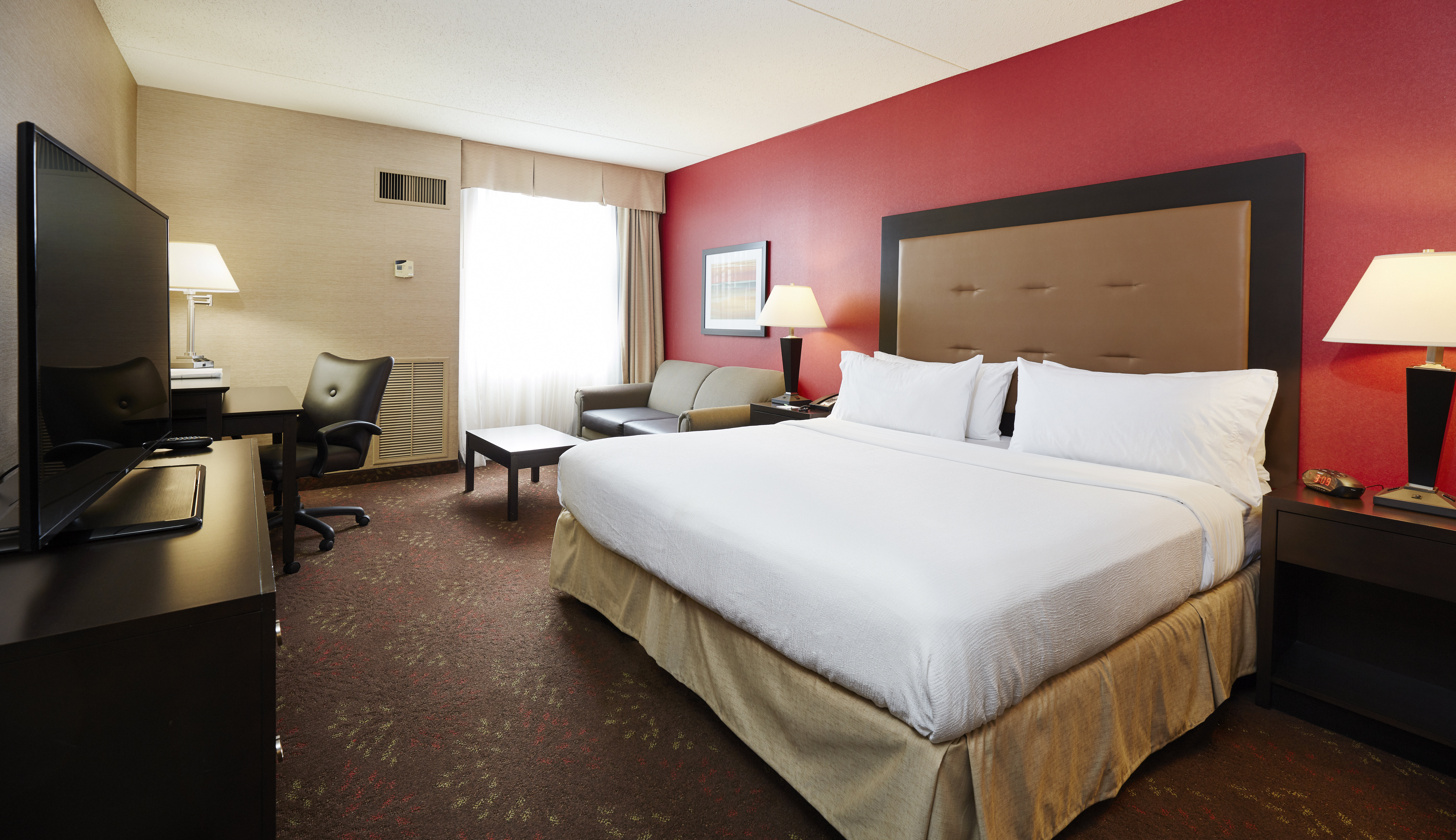 HOLIDAY INN CINCINNATI AIRPORT BY I-guestroom-Sleeper Sofa for extra lounging space or family to stay .jpg