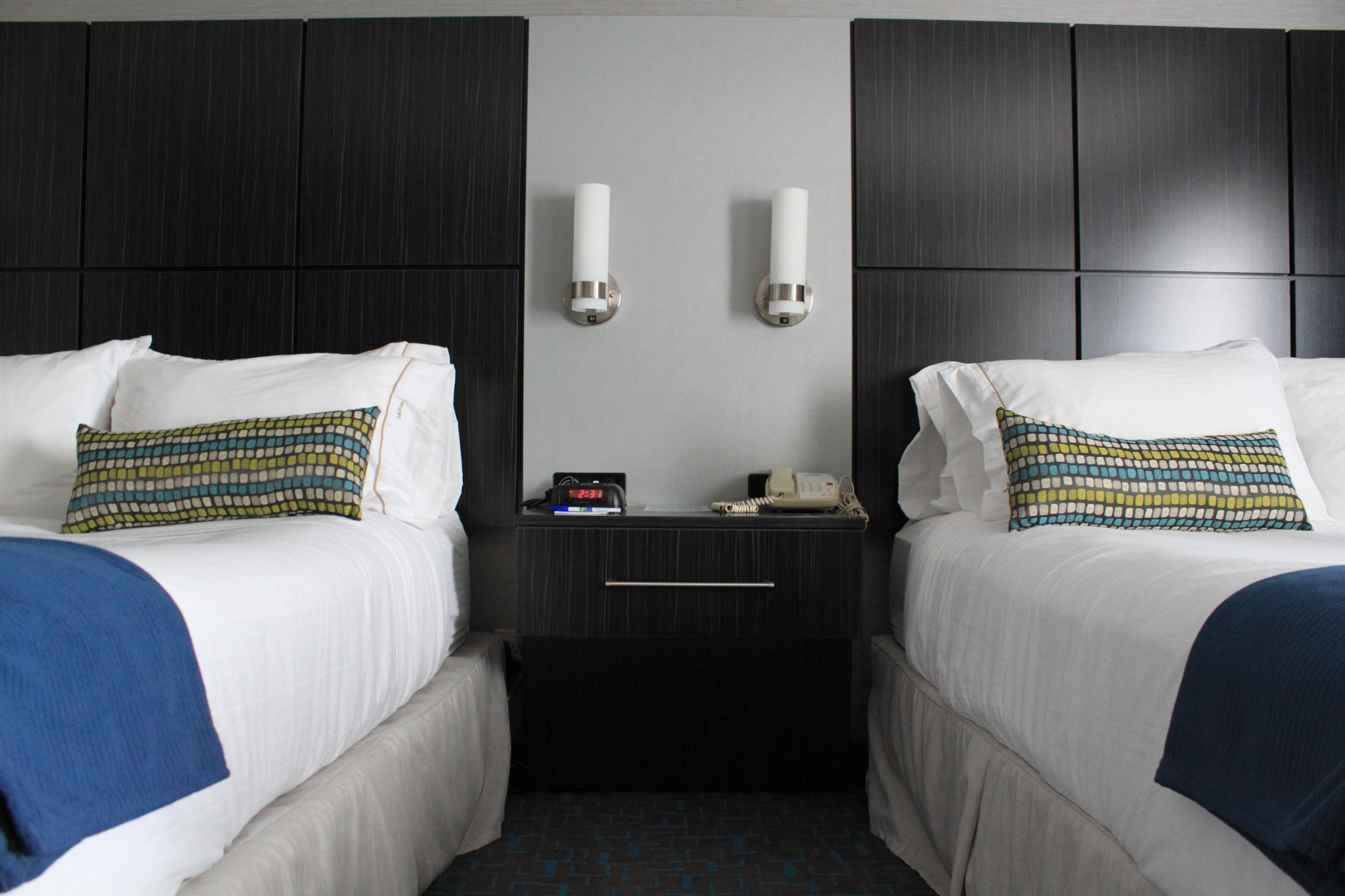 Two-Queen Suite Features Separate Living & Sleeping Rooms