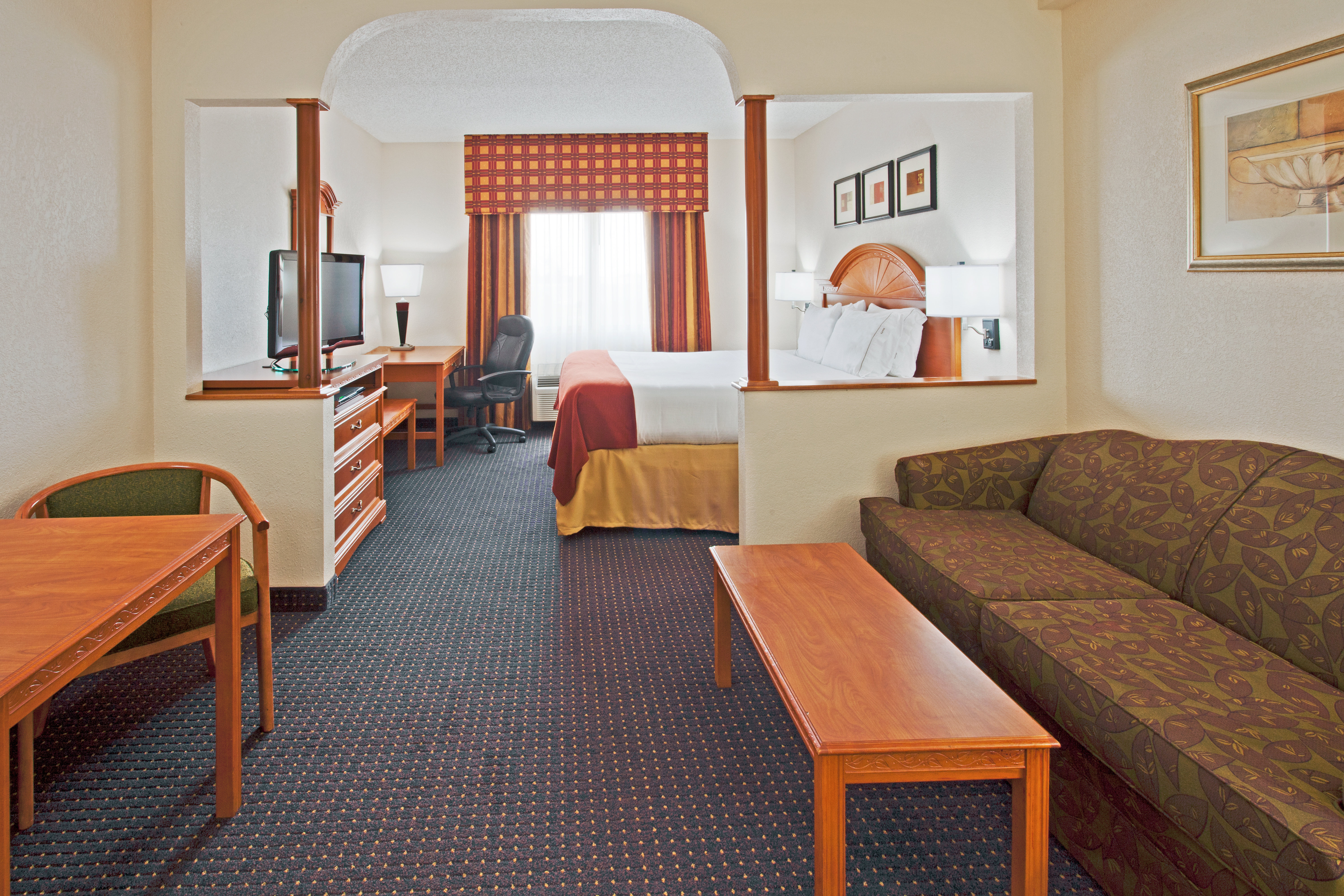 HOLIDAY INN EXP STES AIRPORT W BY I-guestroom-King Bed Suite.jpg