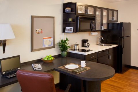 Suites with refrigerator, dishwasher, stove top and microwave