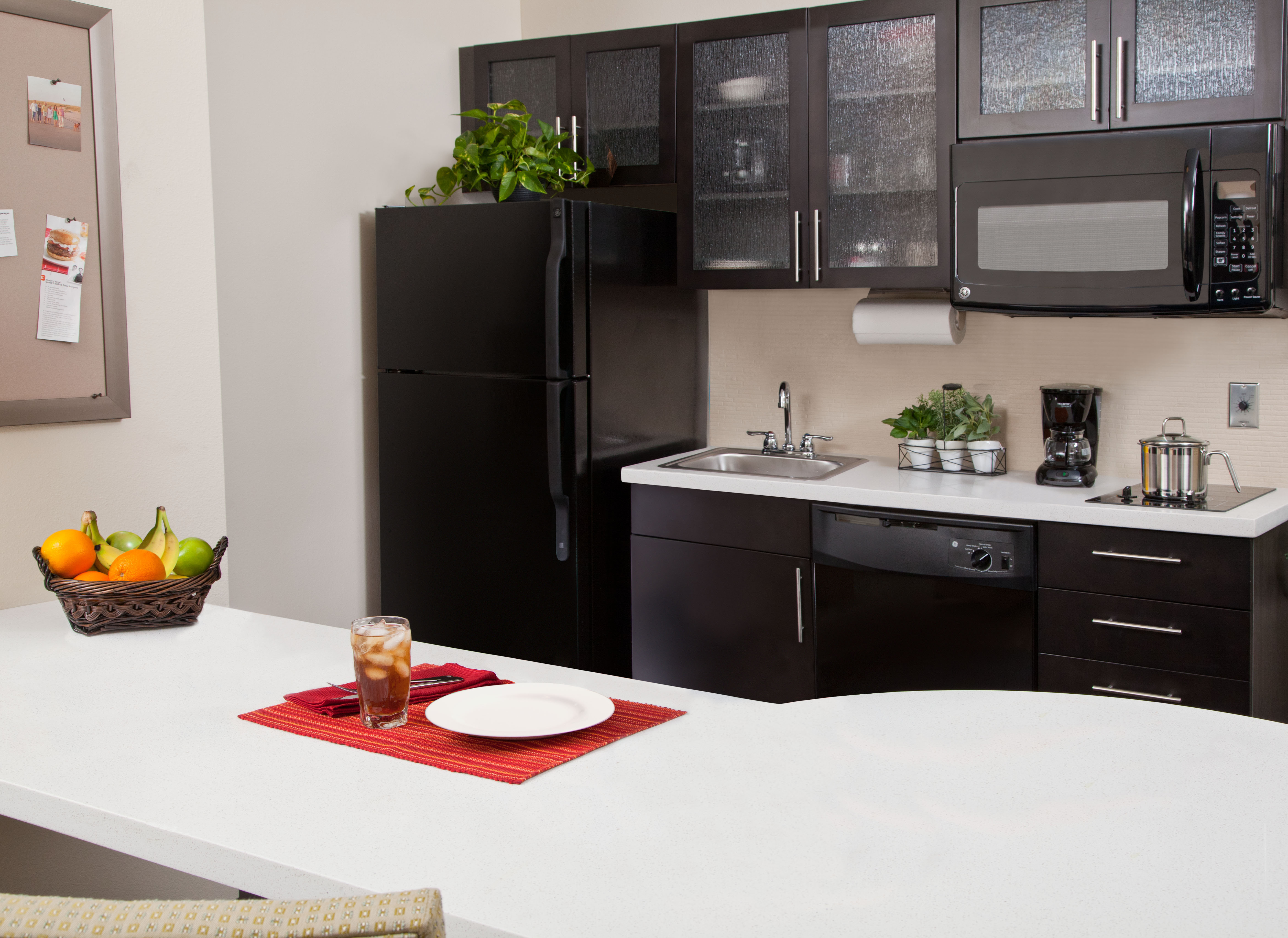 Each suite with a full kitchen and dining area.