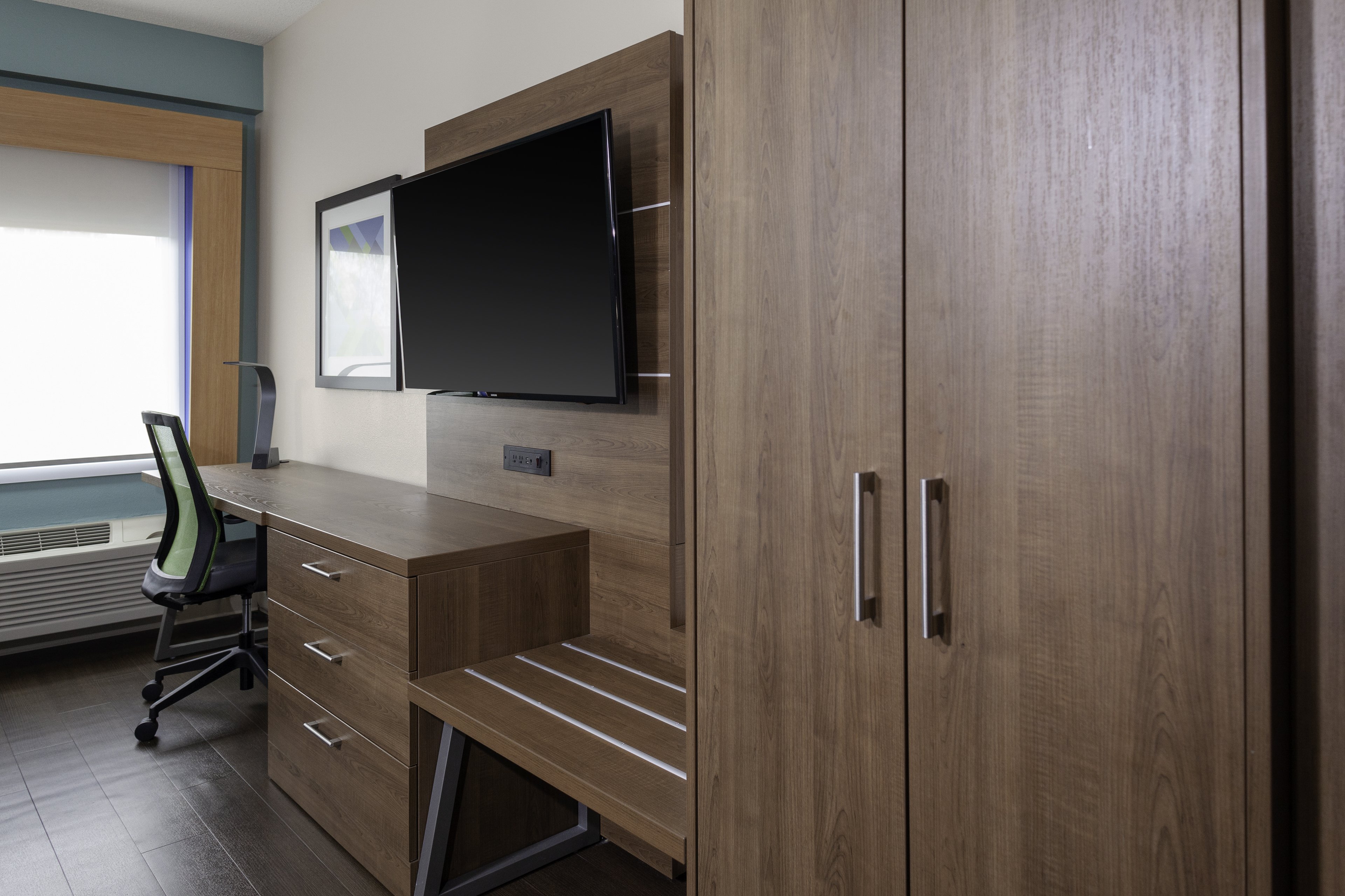 HOLIDAY INN EXP BROADWAY BY IHG-guestroom-Each room has a 55" HDTV for you to catch up on your favorite show.jpg