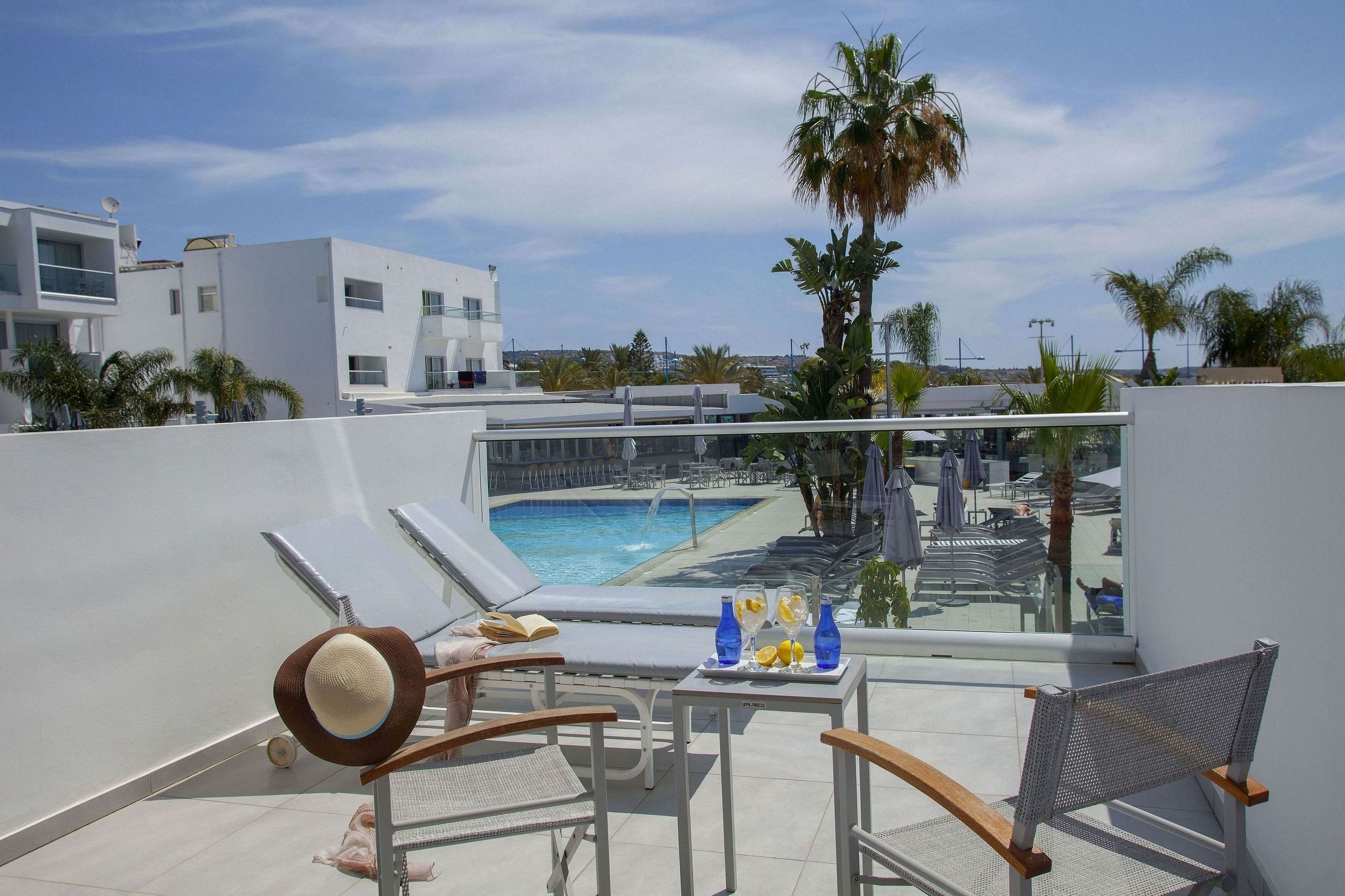 LIMANAKI BEACH HOTEL-guestroom-JUNIOR SUITE POOL VIEW.jpg