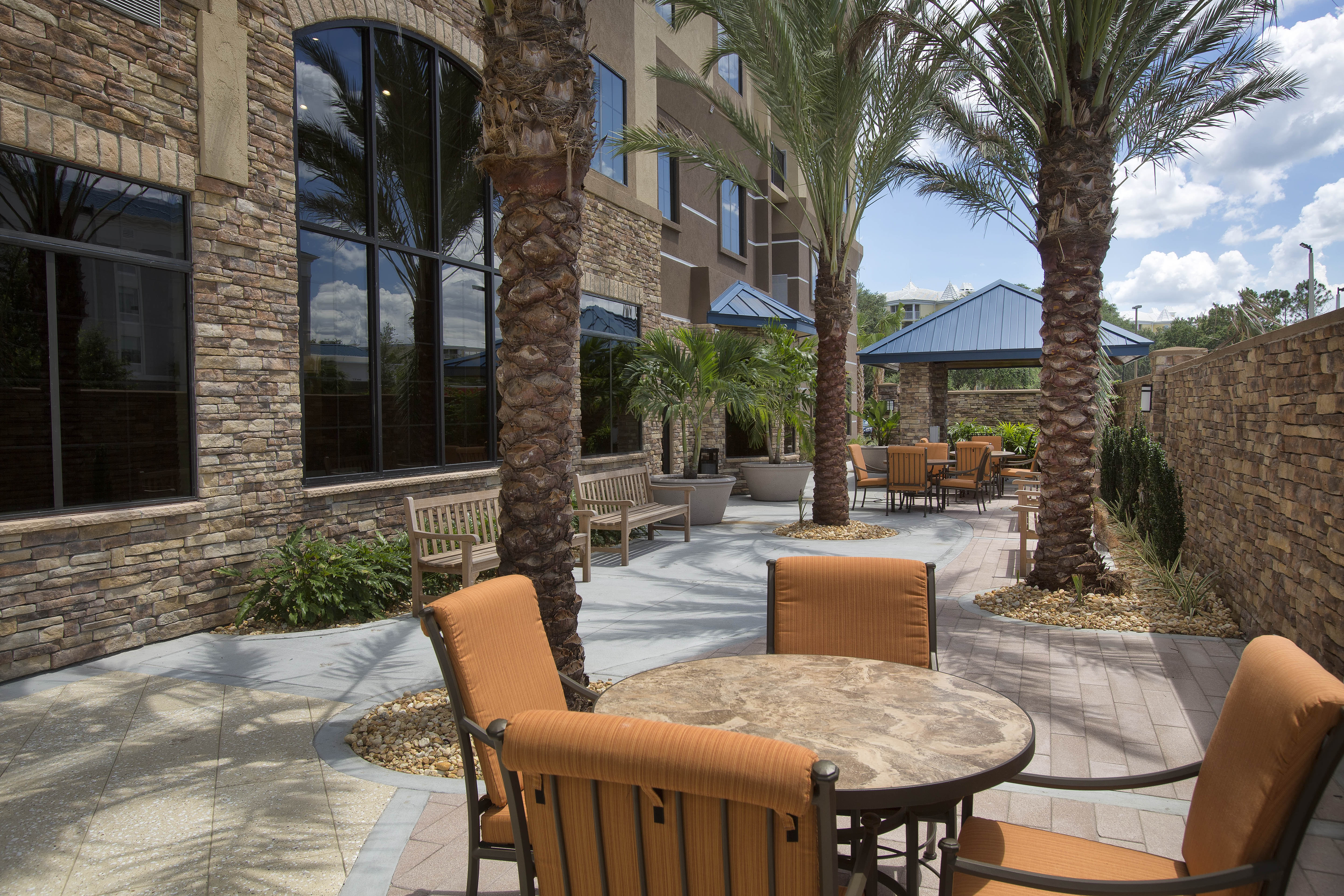 Our Courtyard/Patio area features a gazebo, seating, & bbq grills.
