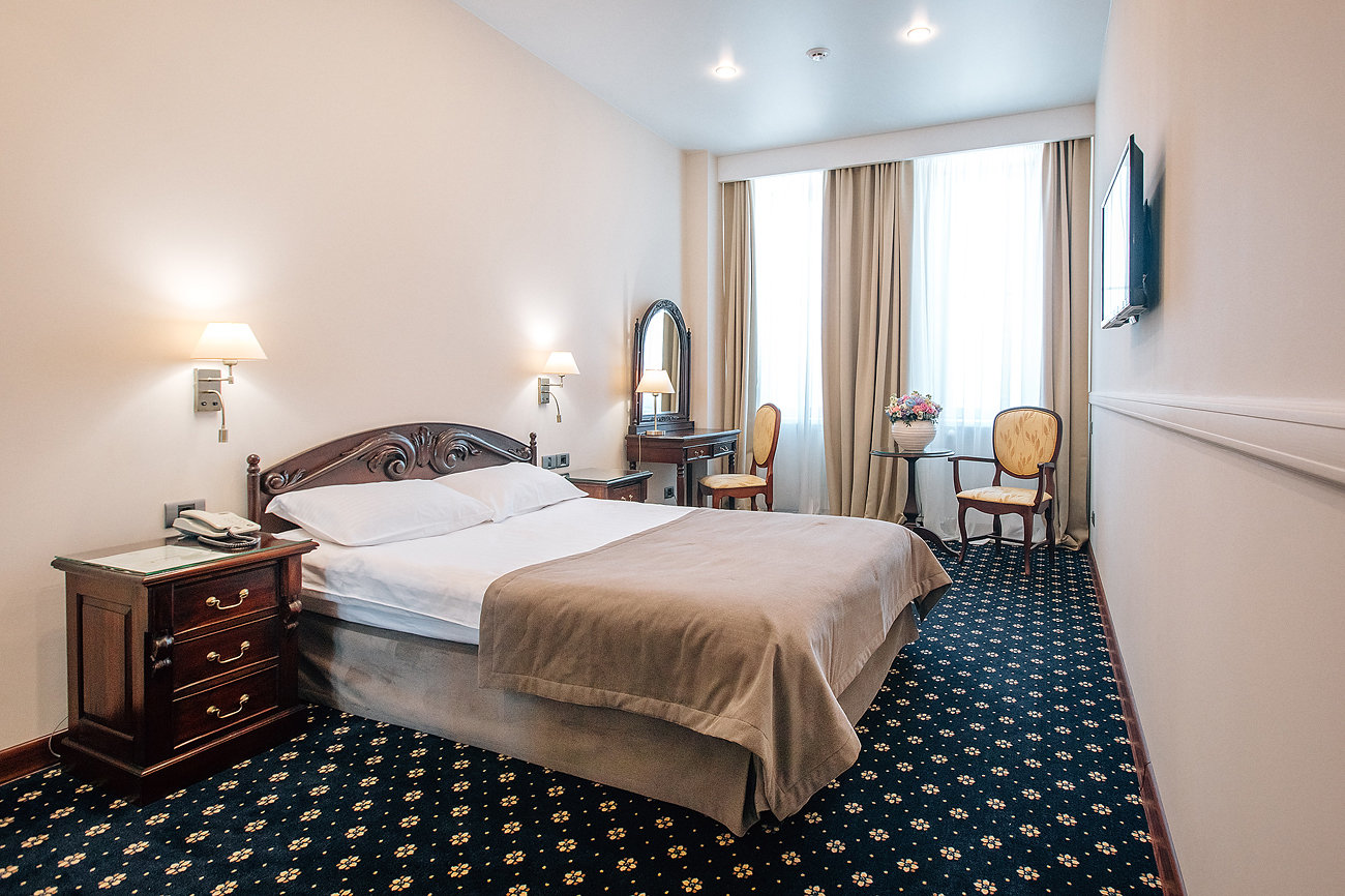 SUN HOTEL-guestroom-Standard Econom Room.jpg