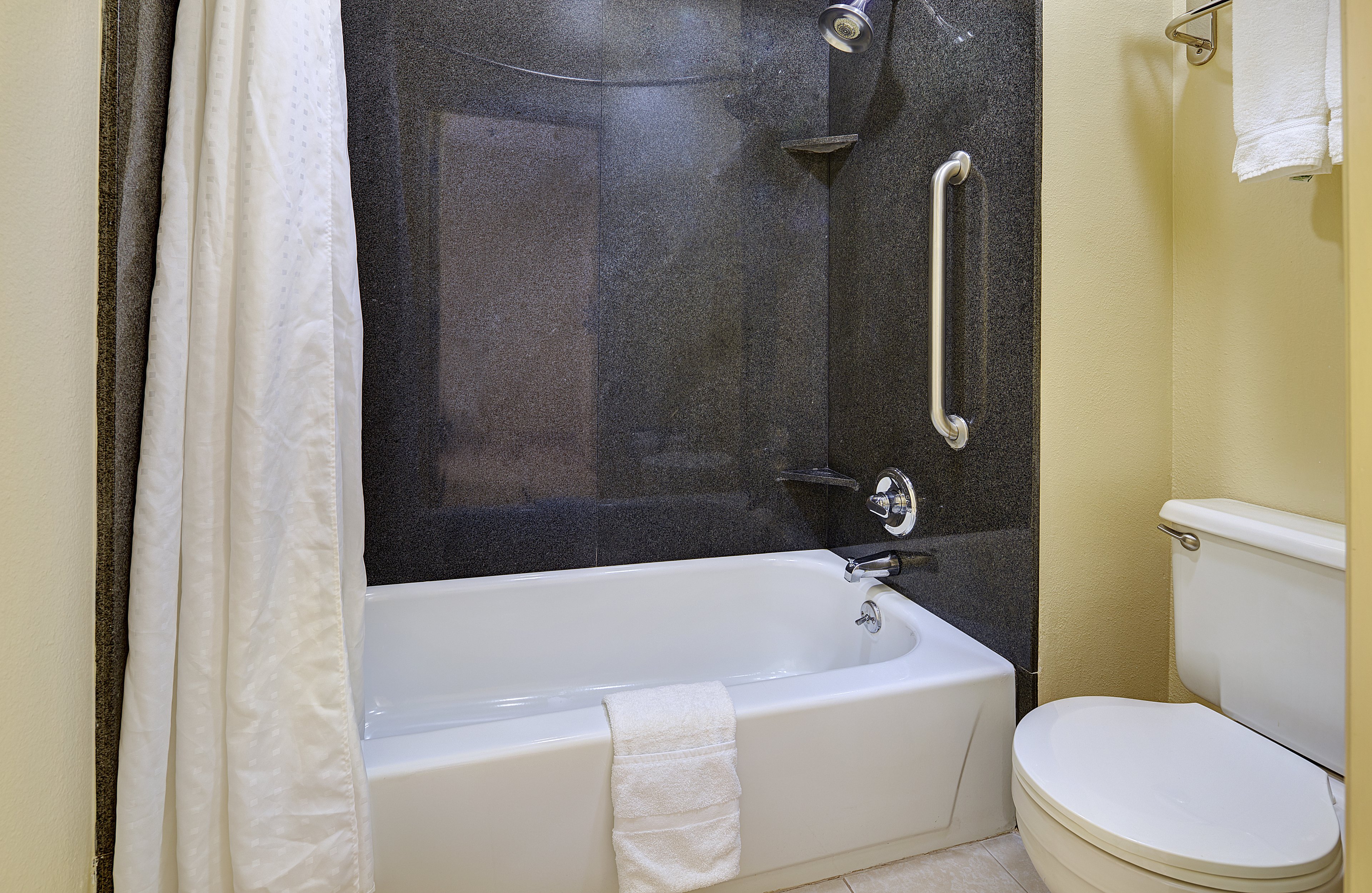 Our guest bathrooms feature luxurious granite.
