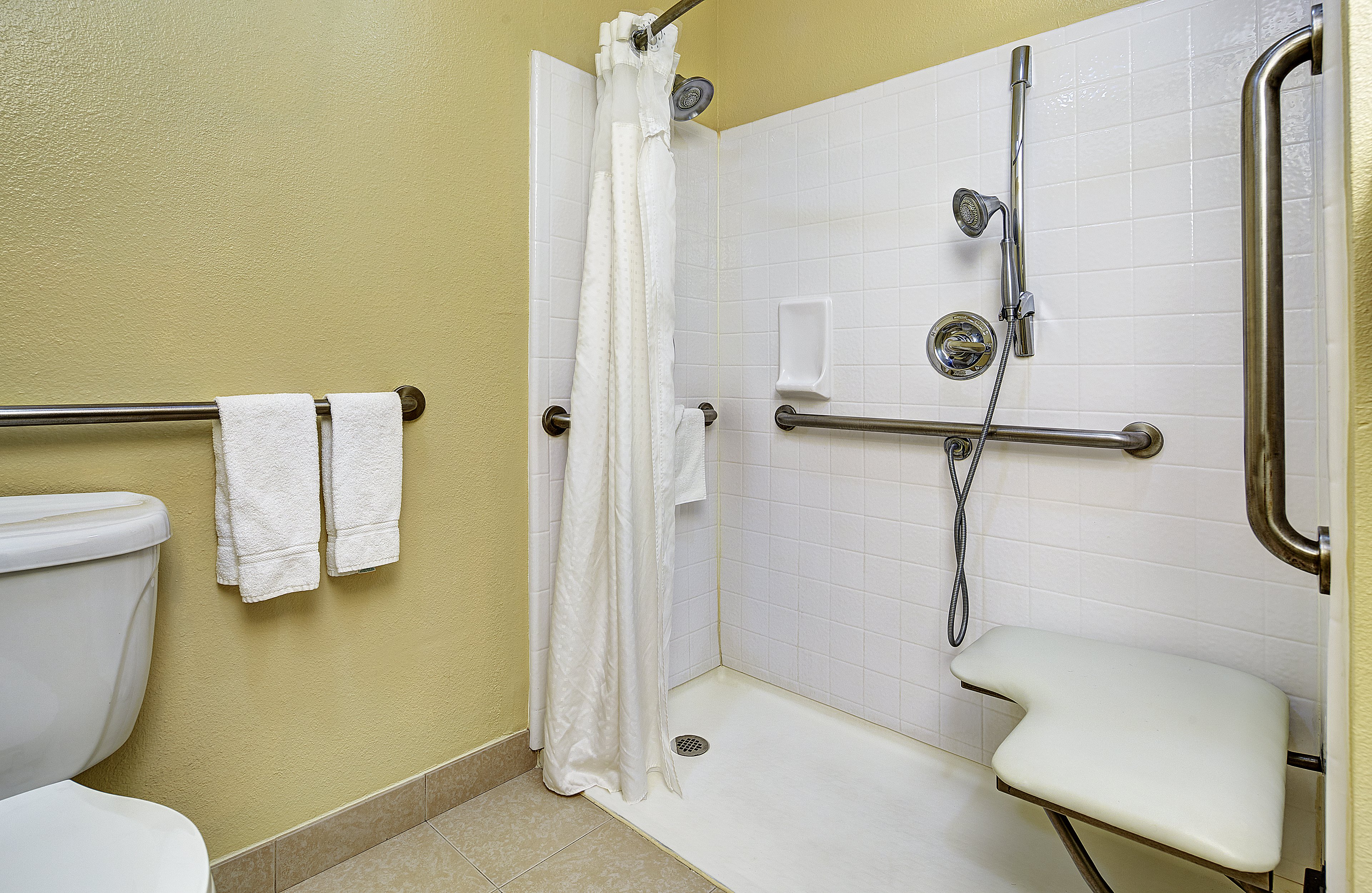 Accessible rooms with roll-in shower are available upon request.