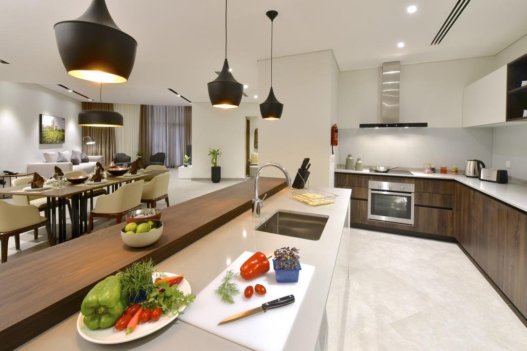 Swiss- Belresidences Juffair-guestroom-Kitchen.jpg