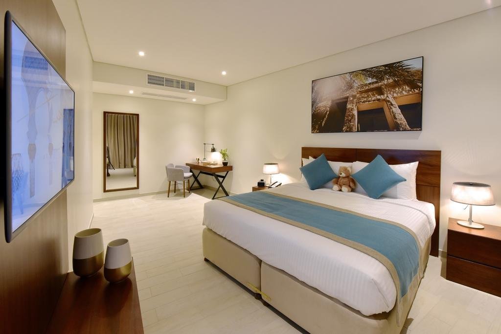 Swiss- Belresidences Juffair-guestroom-Master Bedroom.jpg