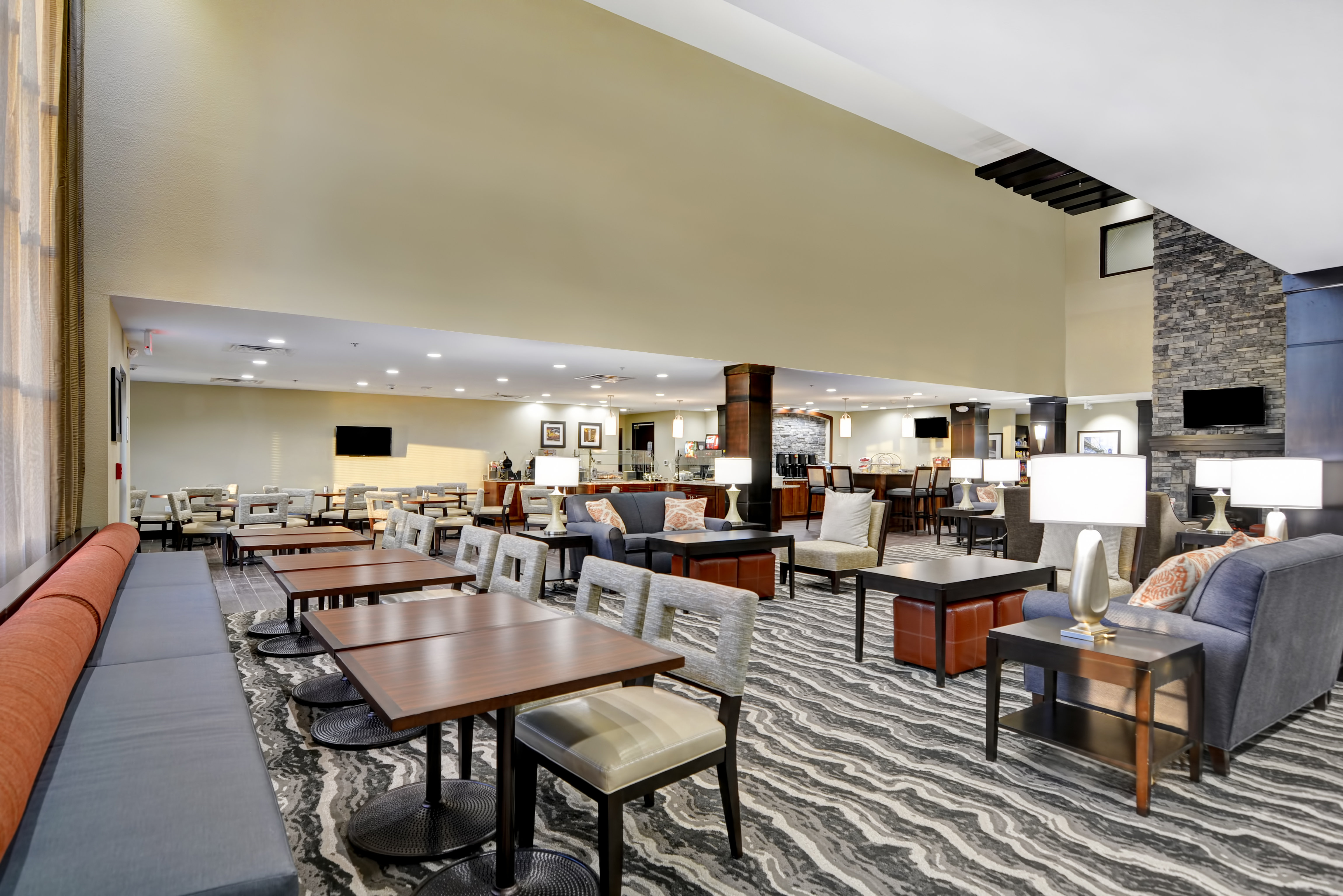 Lounge in our cozy & spacious lobby with ample seating options.