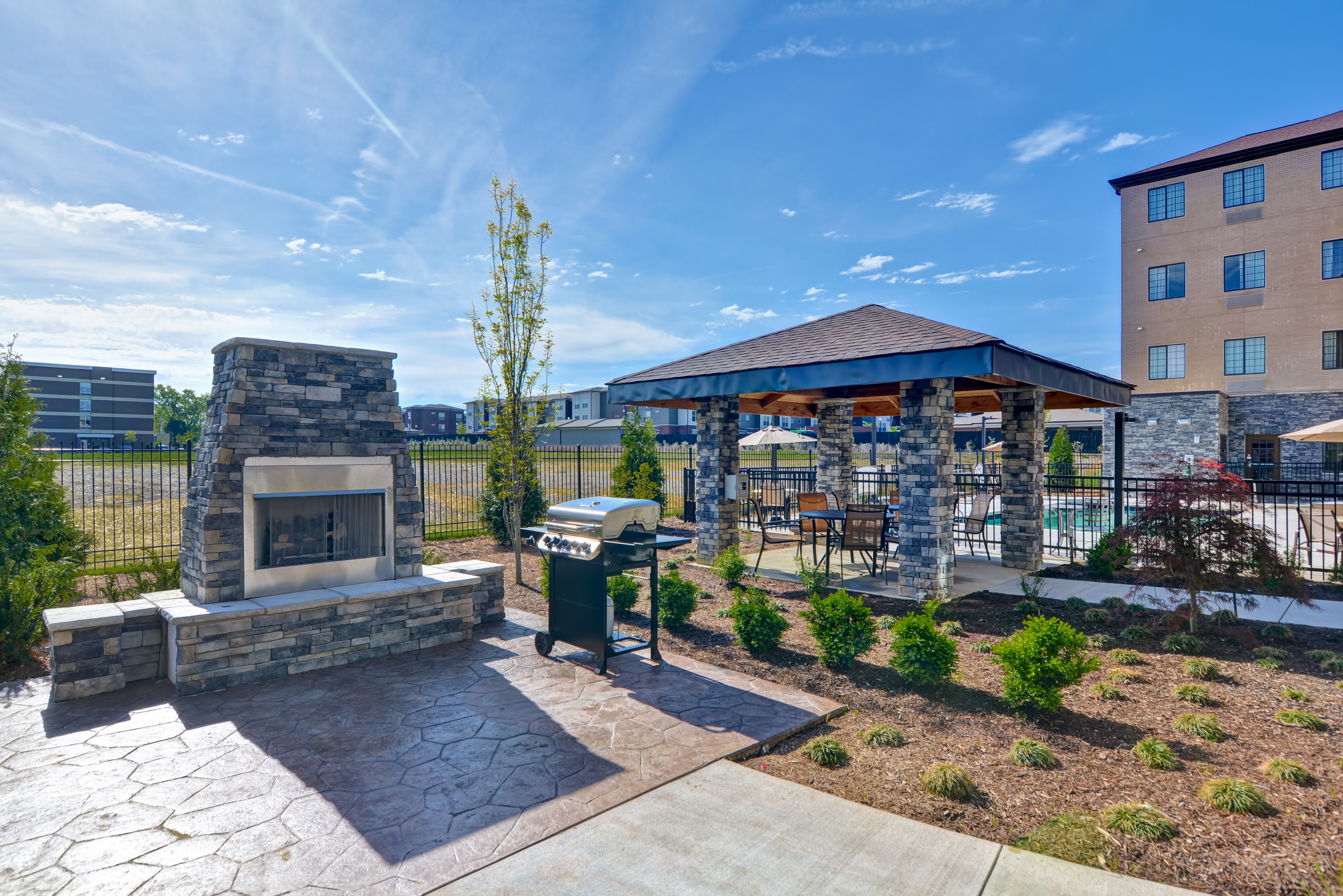 Enjoy the firepit & grills on the patio at our Nashville hotel.