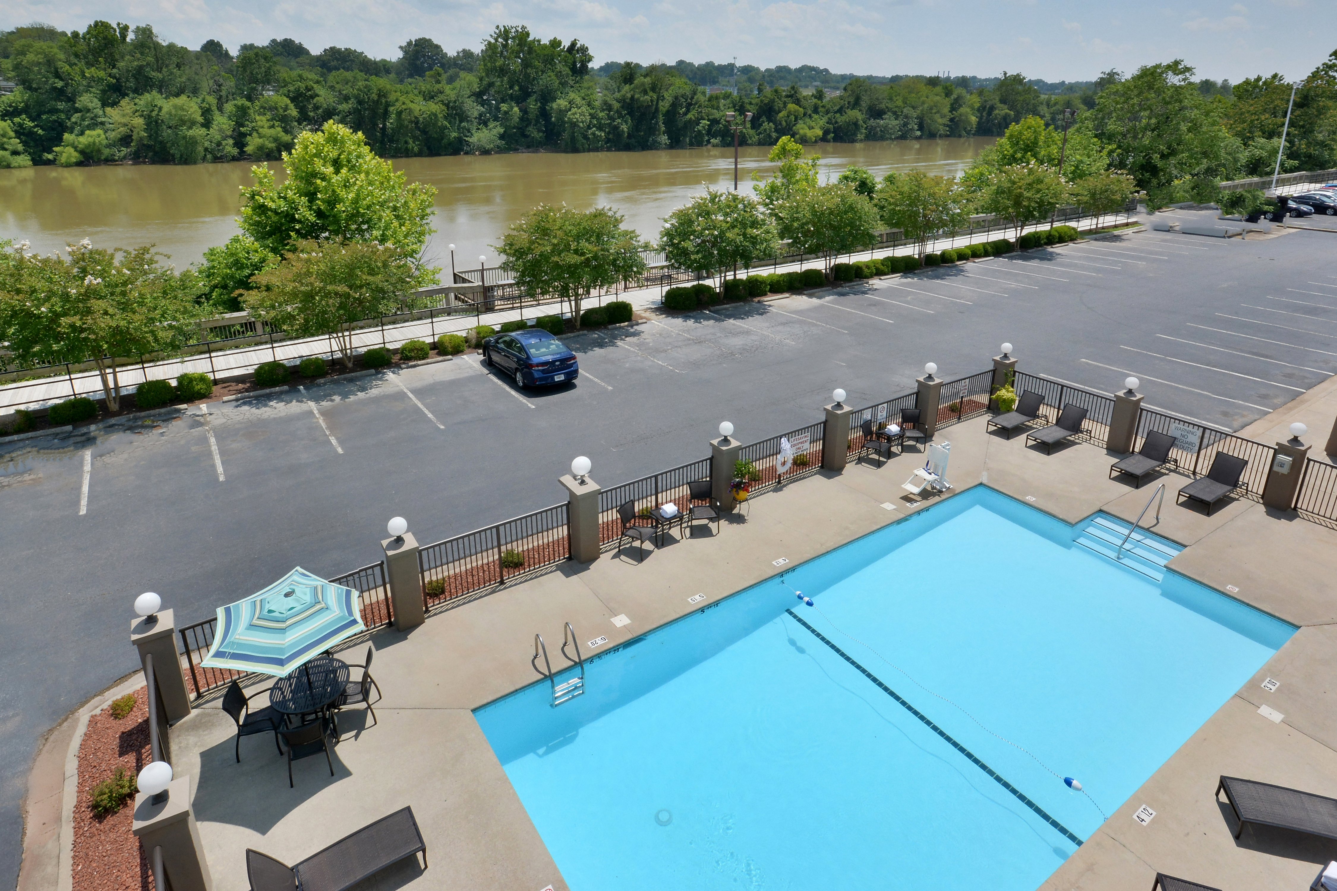 Guests can swim or take a walk along the River Walk Trail.